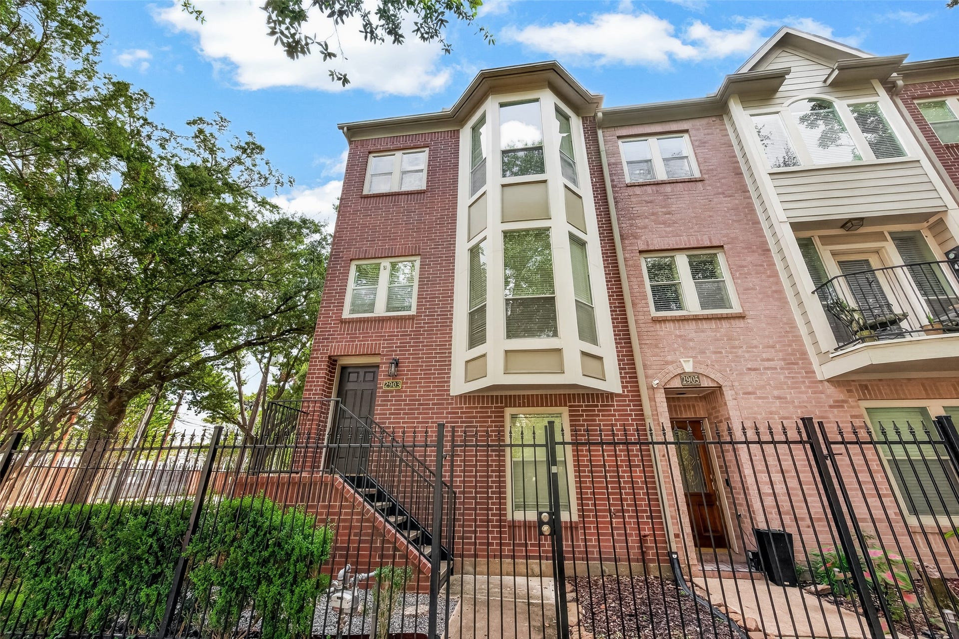 2903 Austin Street, Houston, TX 77004 Come home to a charming exterior with a gated entrance and a sidewalk that leads you right to your front door.