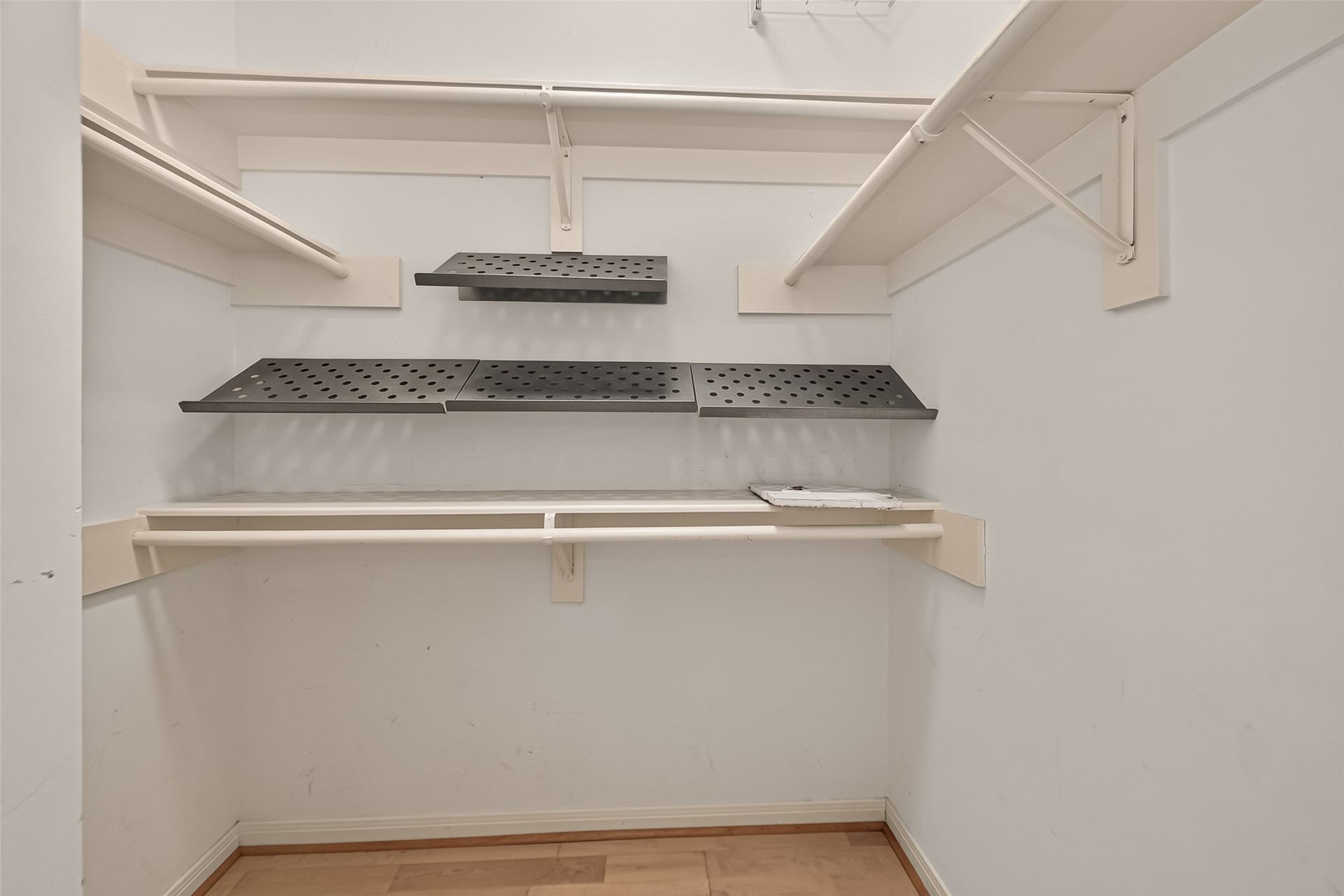 2903 Austin Street, Houston, TX 77004 The spacious hall walk-in closet offers versatile storage possibilities for linens, seasonal items, or household essentials.