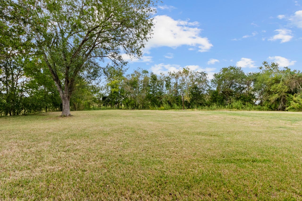 1242 County Road 857, Alvin, TX 77511 Your HUGE backyard, lawn maintenance included