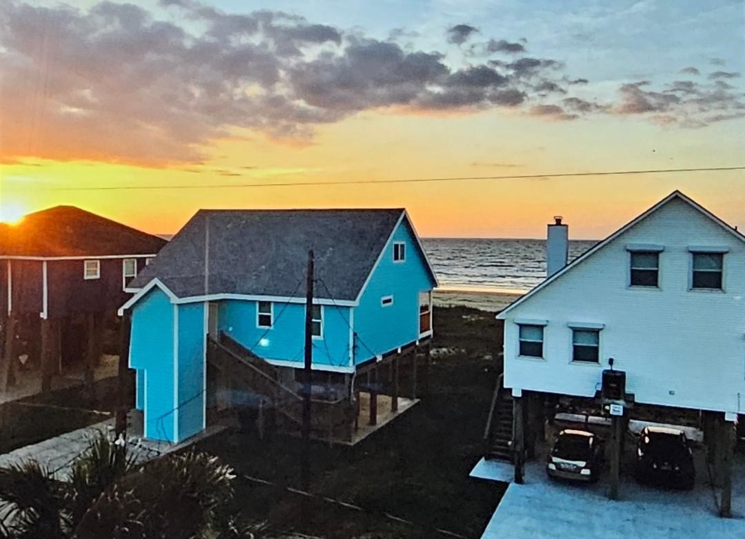 21519 San Luis Pass Road, Galveston, TX 77554 Wake up to breathtaking sunrises over the ocean from your balcony, offering a daily spectacle of natural beauty and serenity.