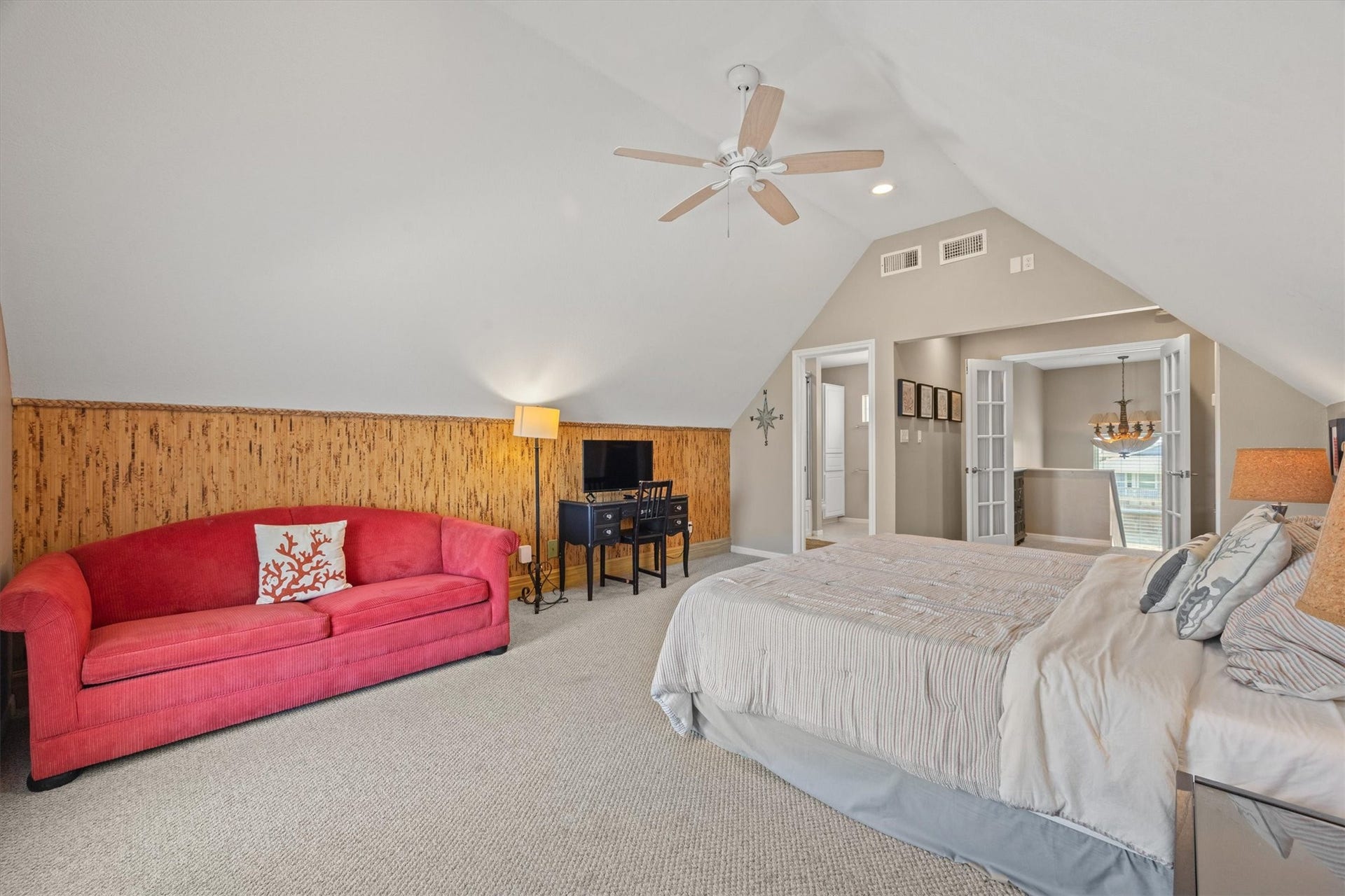 21519 San Luis Pass Road, Galveston, TX 77554 This spacious, airy bedroom offers the perfect blend of comfort and versatility. It has ample room for a sleeper sofa for additional sleep space. This private quarters is a cozy retreat for relaxation or hosting guests.