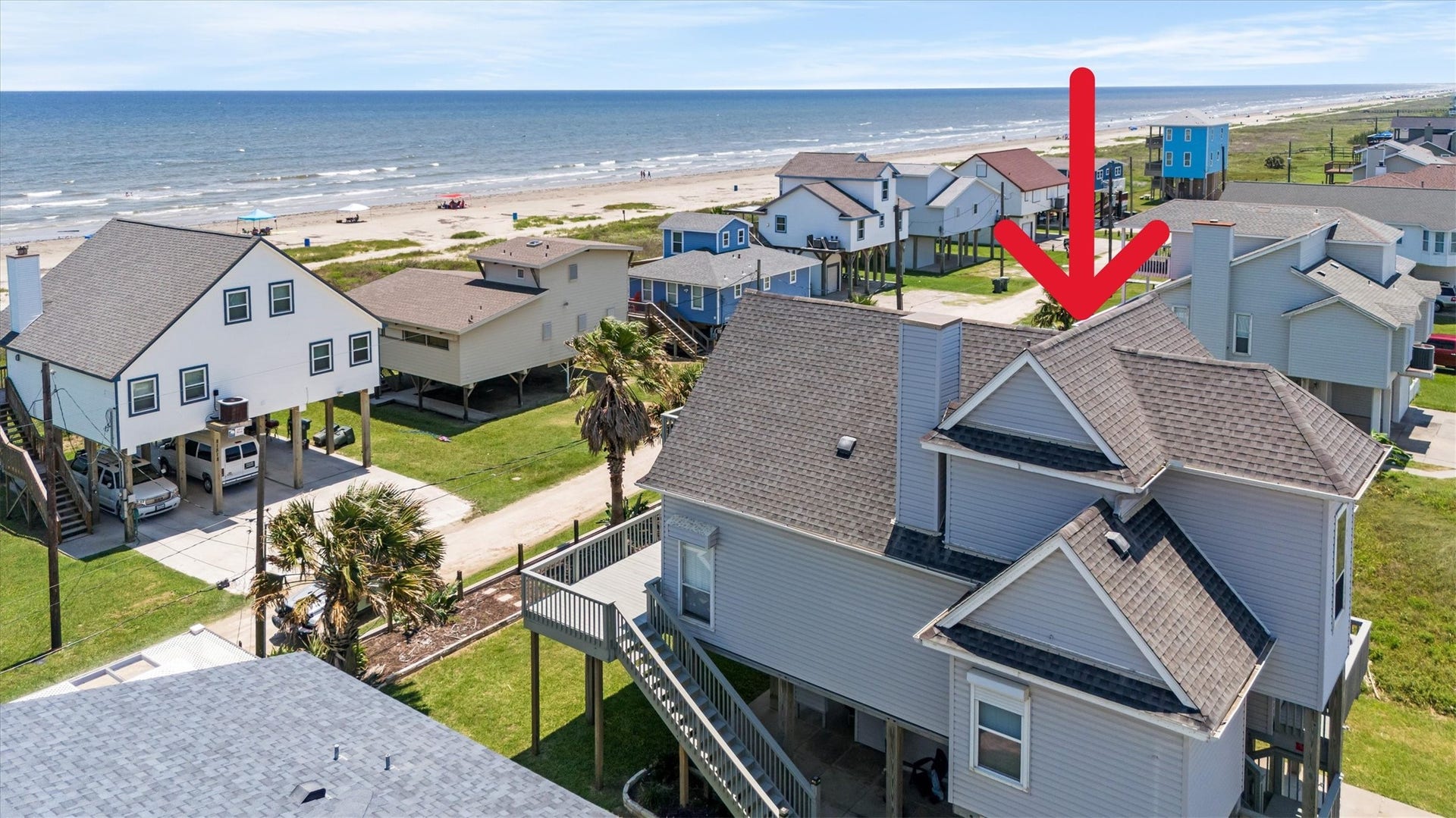21519 San Luis Pass Road, Galveston, TX 77554 This beachside home offers stunning ocean views and is situated just steps from the beach. It features a spacious deck, ideal for relaxing and enjoying the coastal breeze. Perfect for those seeking a serene seaside lifestyle.