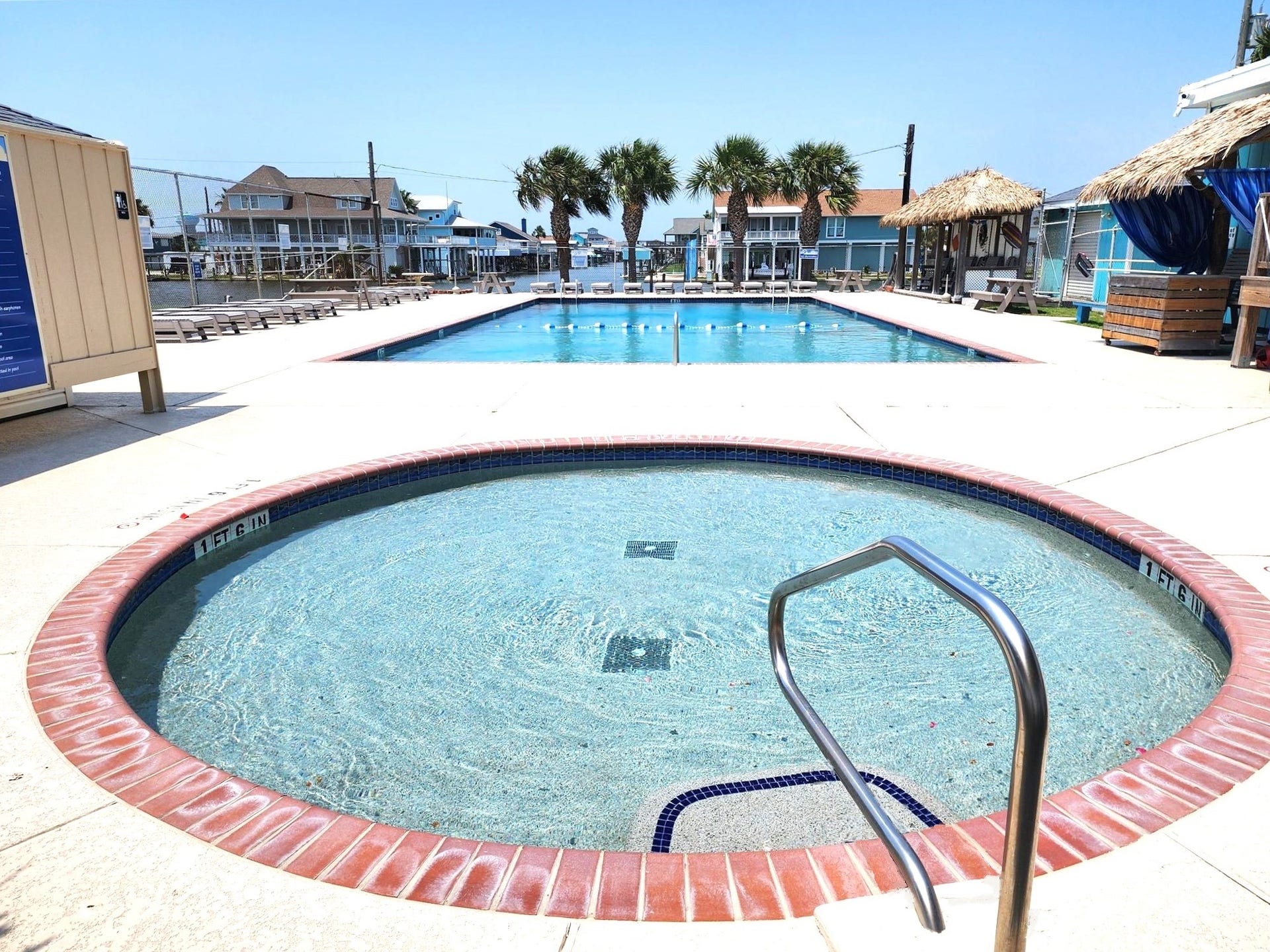 21519 San Luis Pass Road, Galveston, TX 77554 Discover the perfect family retreat with this inviting Sea Isle baby pool, where relaxation meets fun in a charming coastal setting.