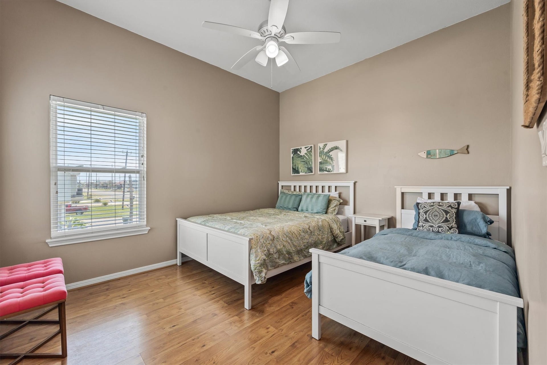 21519 San Luis Pass Road, Galveston, TX 77554 Discover another cozy and inviting Bedroom 2, featuring warm tones and abundant natural light that creates a serene and welcoming atmosphere.