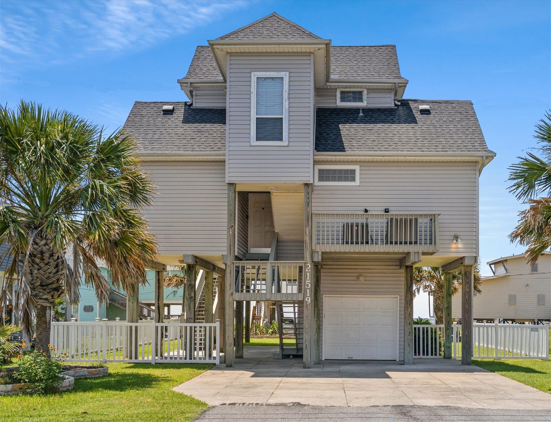 21519 San Luis Pass Road, Galveston, TX 77554 Discover your coastal retreat on San Luis Pass Road, featuring an inviting elevated design with an extra-wide driveway for ample parking space.