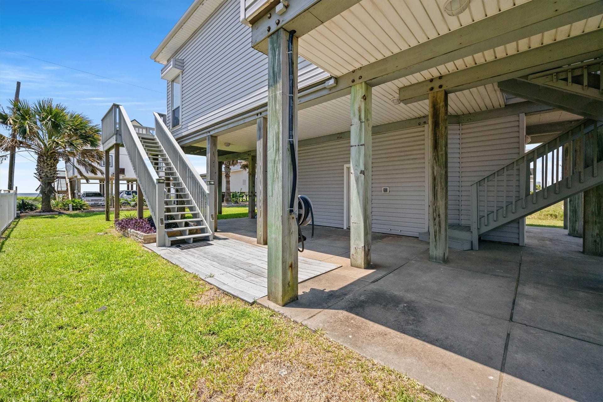 21519 San Luis Pass Road, Galveston, TX 77554 This inviting shady area is perfect for grilling, playing, and relaxing while soaking in the refreshing ocean breezes.