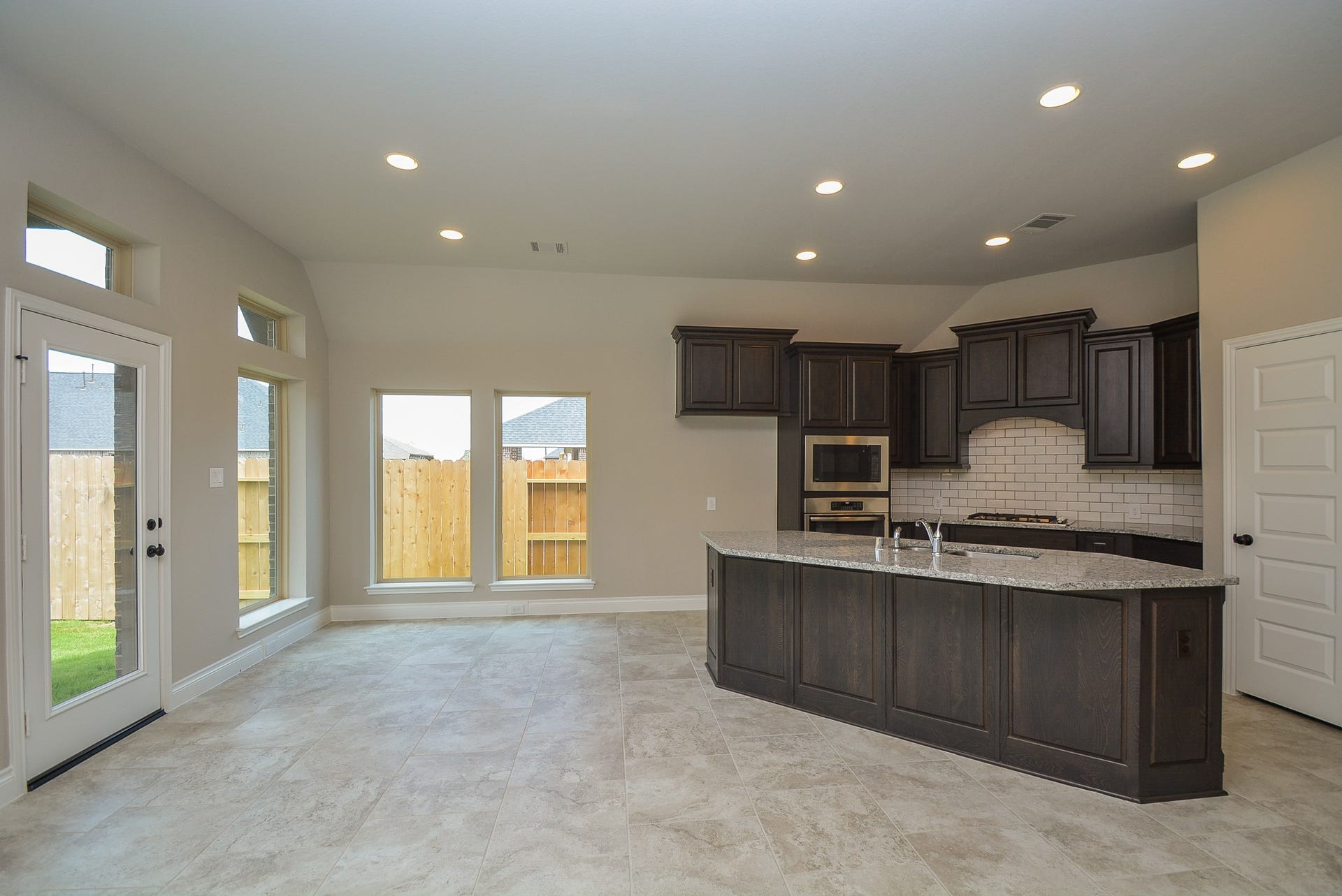 Open island kitchen overlook family room