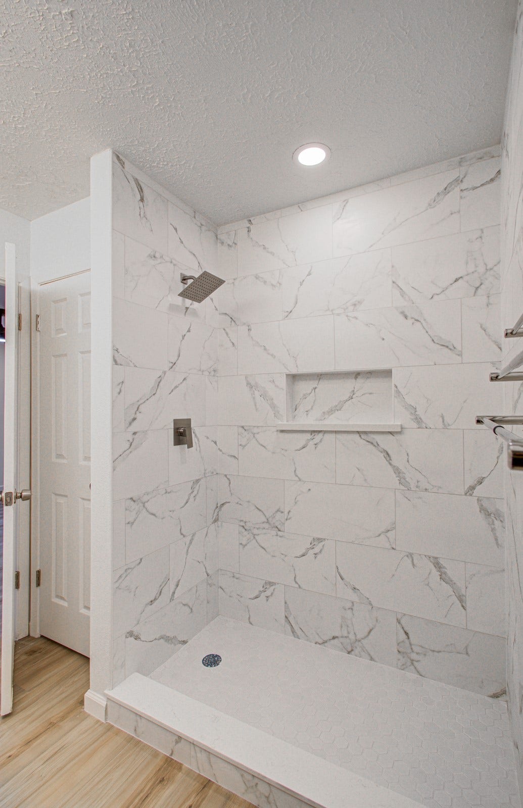 Primary bathroom with a modern shower