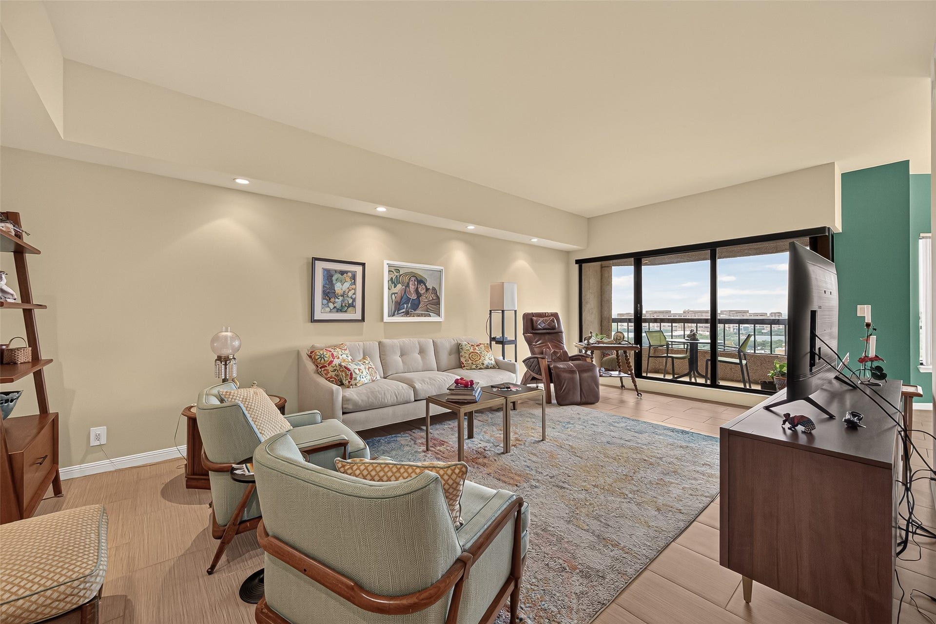 2001 Holcombe Boulevard, #1305, Houston, TX 77030 spacious living room with balcony access