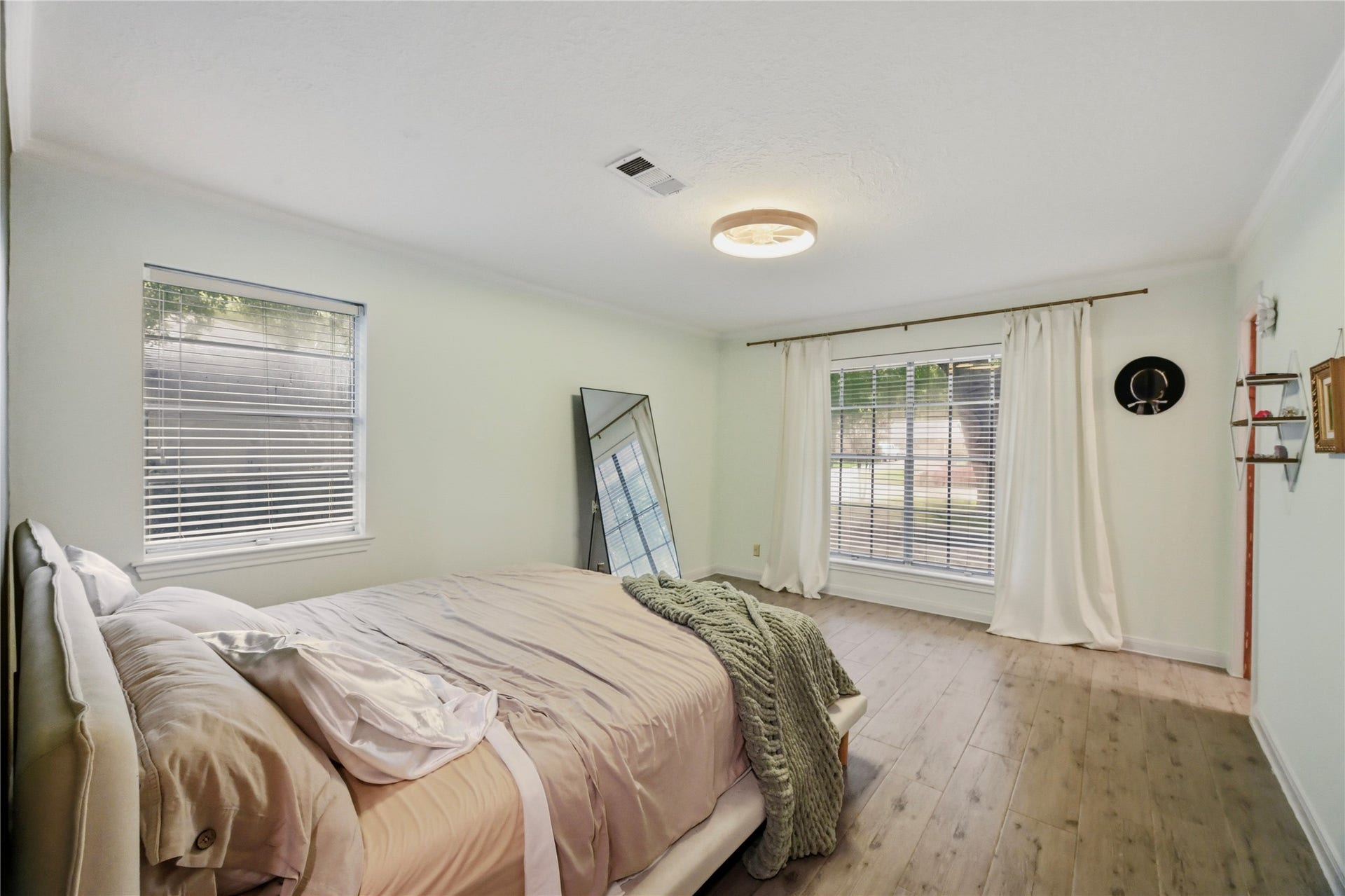 Serene primary suite designed for rest and relaxation