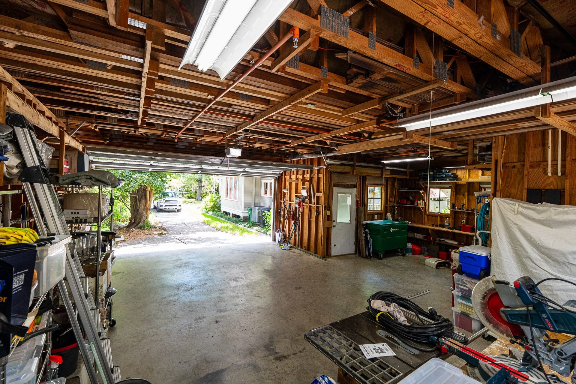 1841 Cortlandt Street, Houston, TX 77008 Garage ceilings are 10' tall with plenty of room for lumber storage.