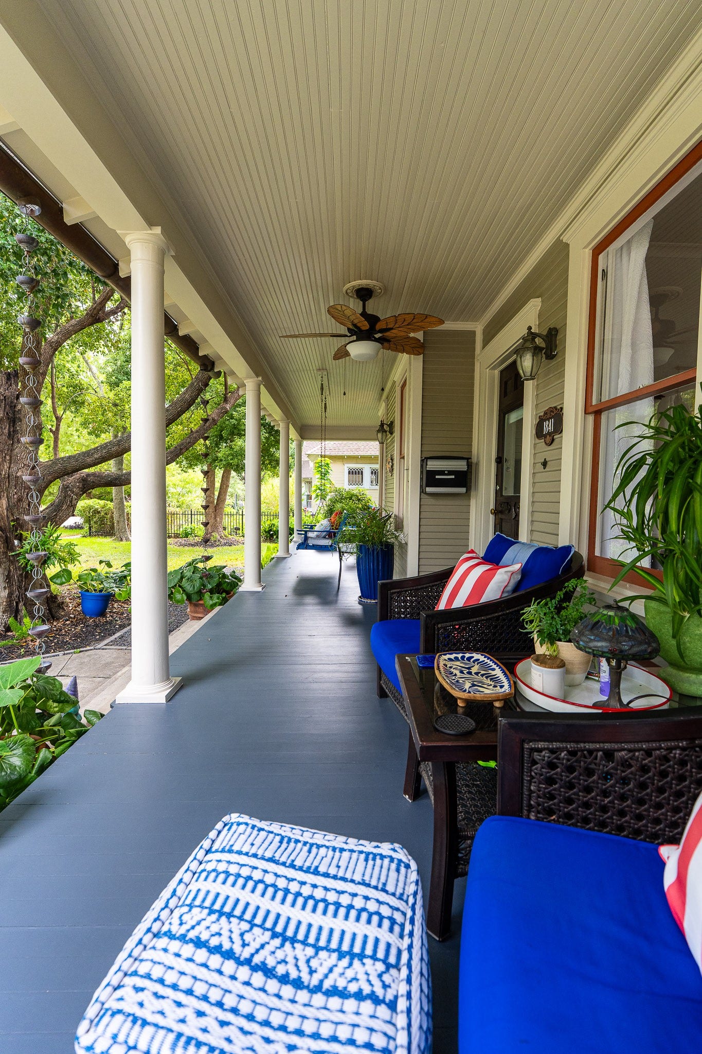 1841 Cortlandt Street, Houston, TX 77008 the front porch spans the width of the house and is decorated with comfortable, colorful pillows and beautiful plants! The front porch is about 38' long!