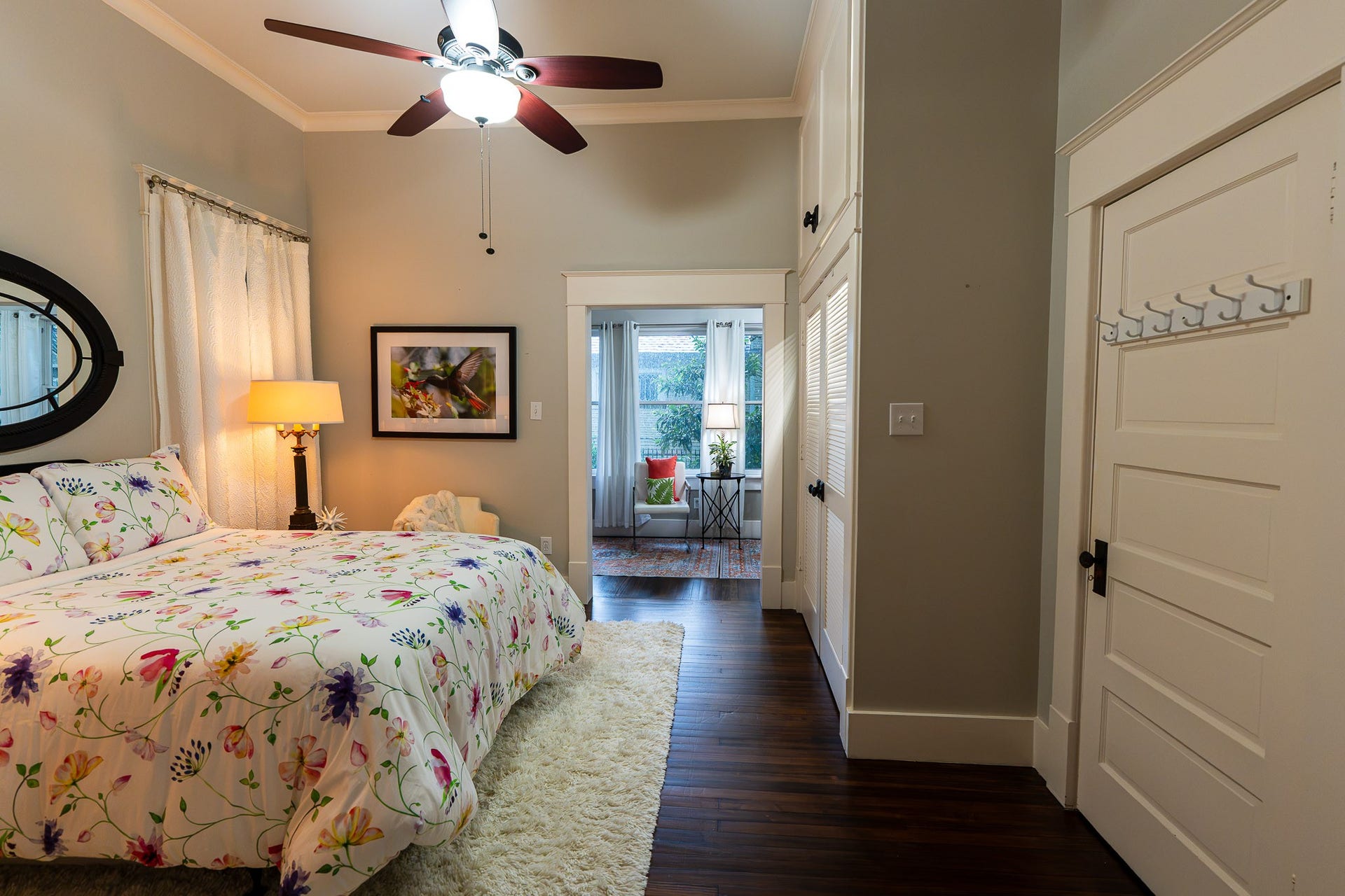 1841 Cortlandt Street, Houston, TX 77008 Front bedroom looking into the sun room, has double door closet with overhead storage, great for suit cases! and has a utility closet and another overhead storage, and a ceiling fan!