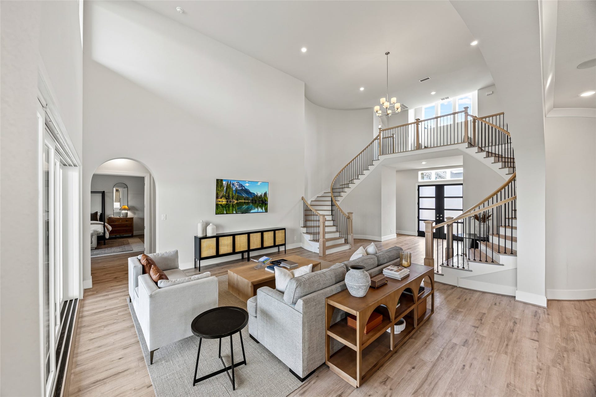 Soaring ceilings enhance the homes open, inviting ambiance while exuding luxury