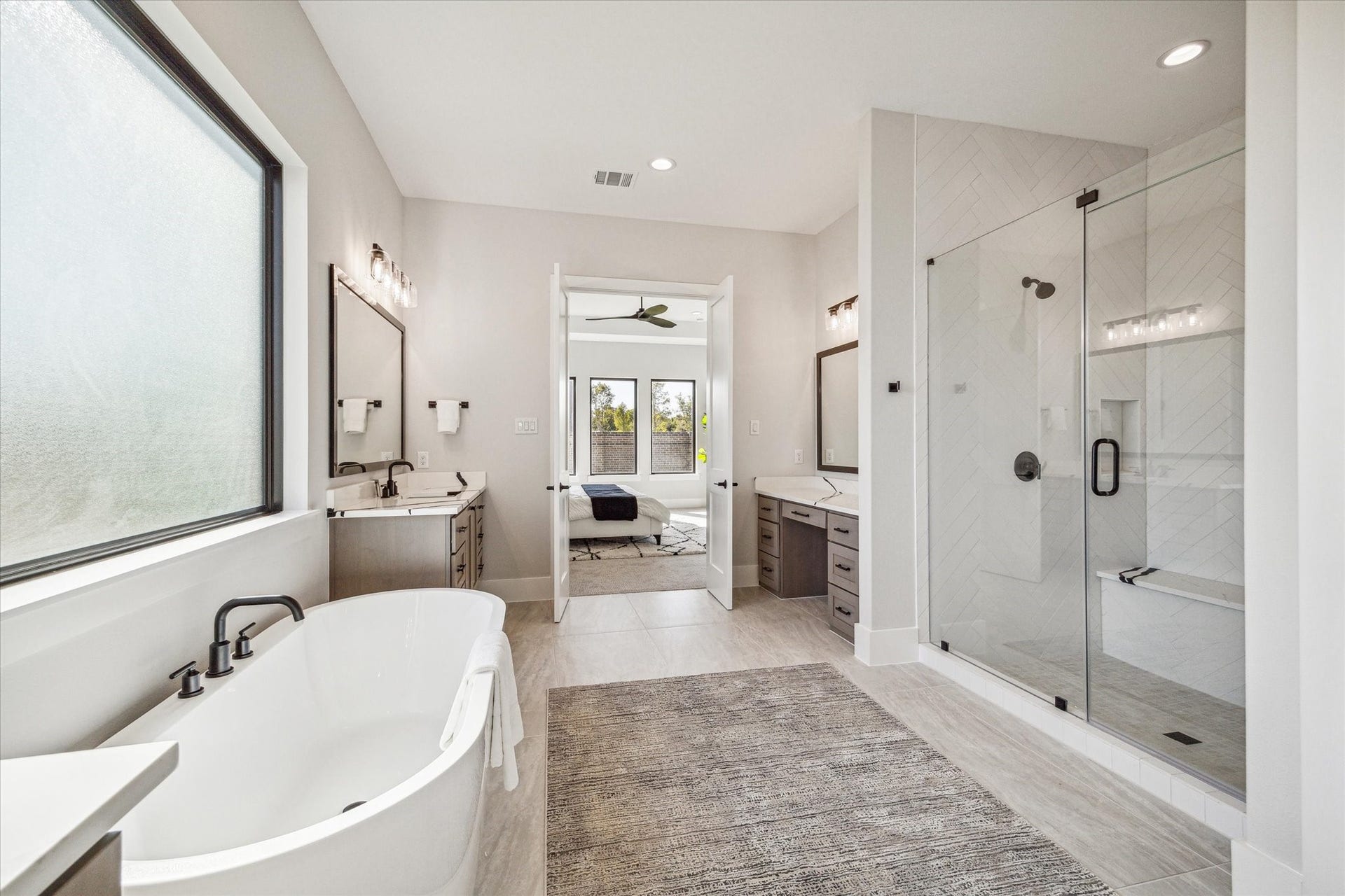 11006 Stonegate Court, Missouri City, TX 77459 Primary Bath has 67 soaking bathtub and an oversized walk-in shower with dual heads