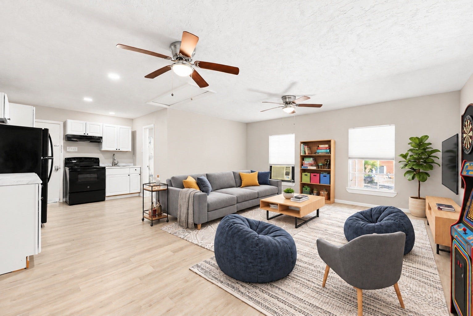 A fantastic bonus to this property! The garage apartment offers approximately 450 square feet of additional space, with a large open living area, kitchen, and full bathroom. Virtually staged.
