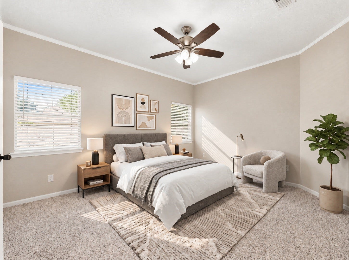 The spacious upstairs primary bedroom offers a relaxing escape with fresh paint, new carpet, and large windows that bring in plenty of natural light. Virtually staged.