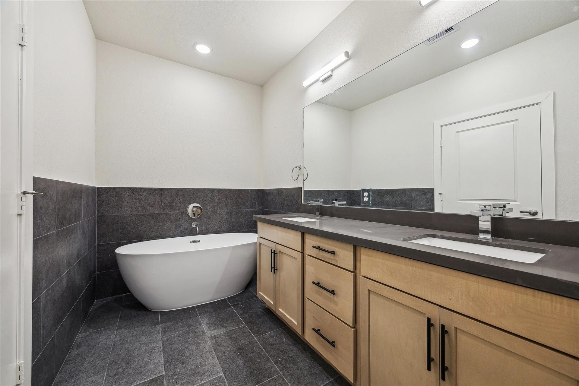 6517 Rena Street, Houston, TX 77092 Representative photo of primary bath. Layout and selections may vary.
