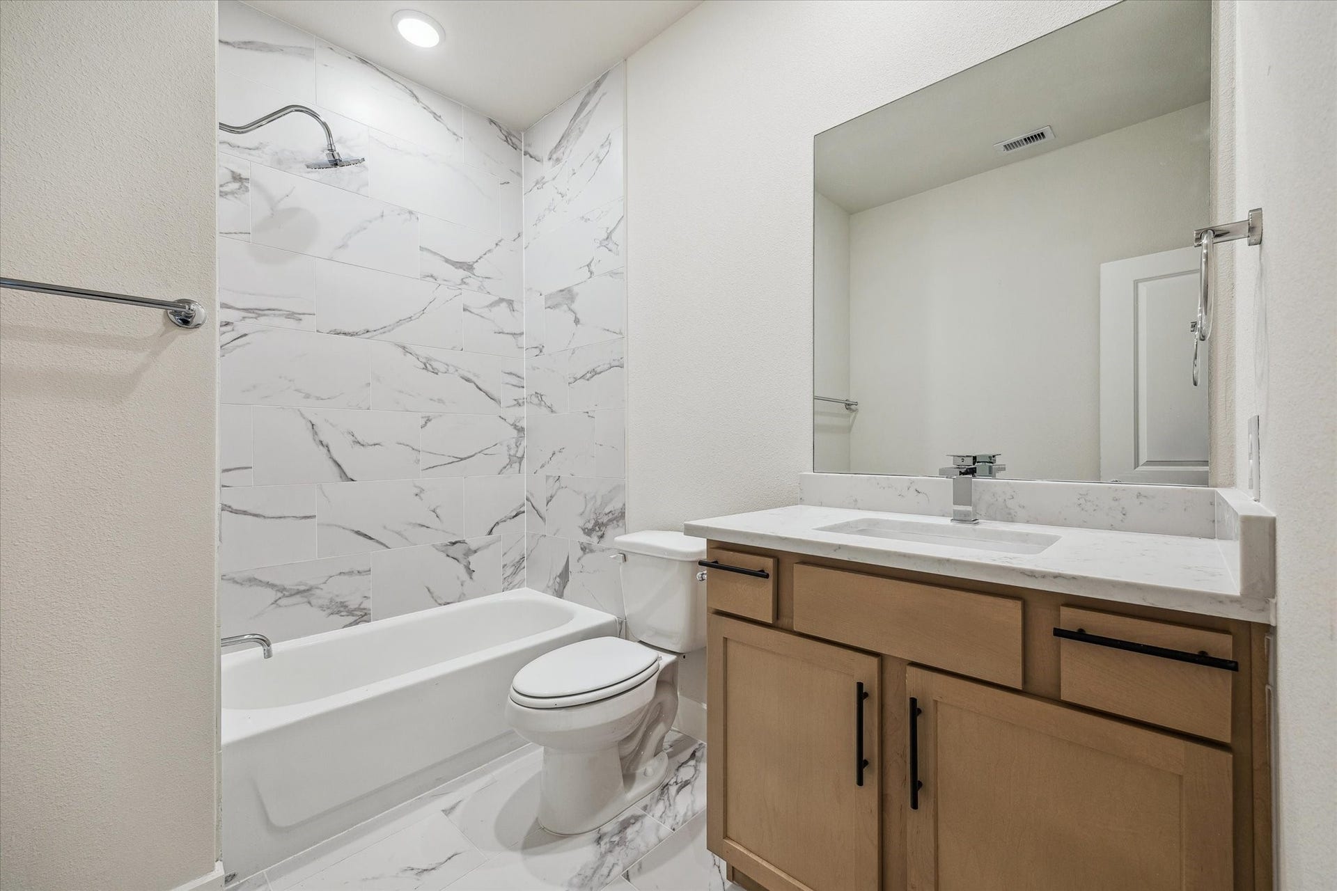 6517 Rena Street, Houston, TX 77092 Representative photo of secondary bedroom's bath. Layout and selections may vary.