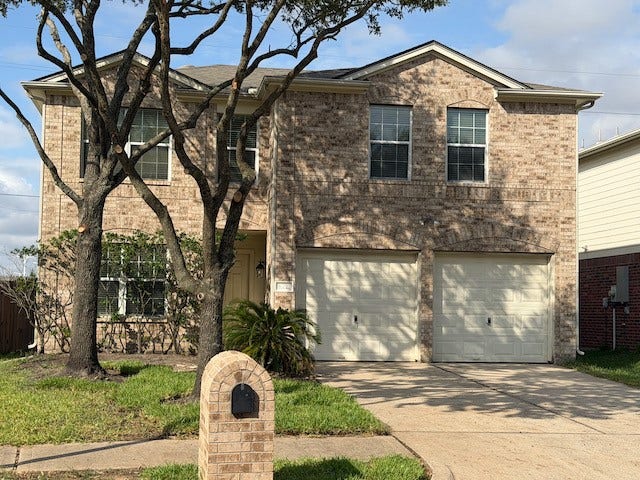 20023 Cypresswood Glen, Spring, TX 77373 Convenient double wide driveway. Energy efficient home with double pane windows and a/c less than a year old!