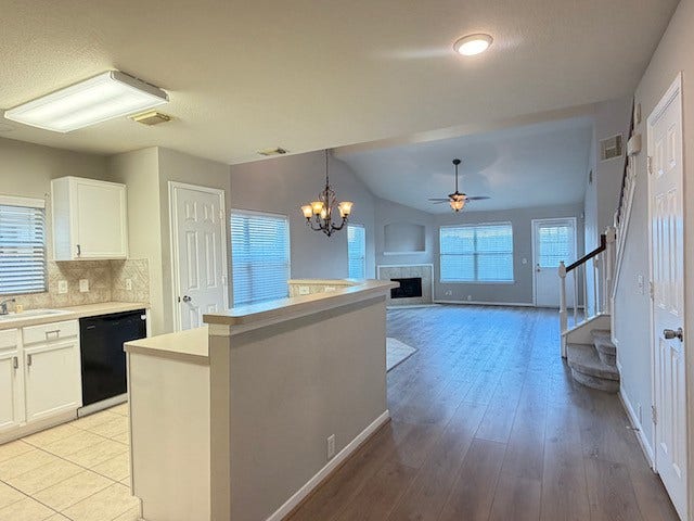20023 Cypresswood Glen, Spring, TX 77373 2" wide faux wood blinds throughout.