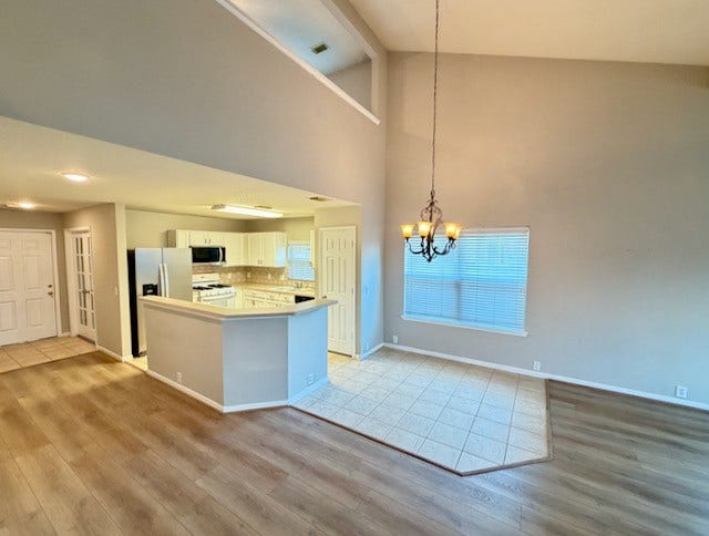 20023 Cypresswood Glen, Spring, TX 77373 Tiled kitchen and eating area.