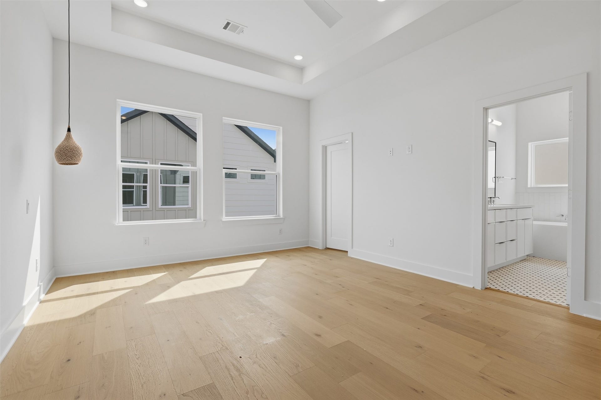 An adjoining bathroom keeps the primary suite connected.