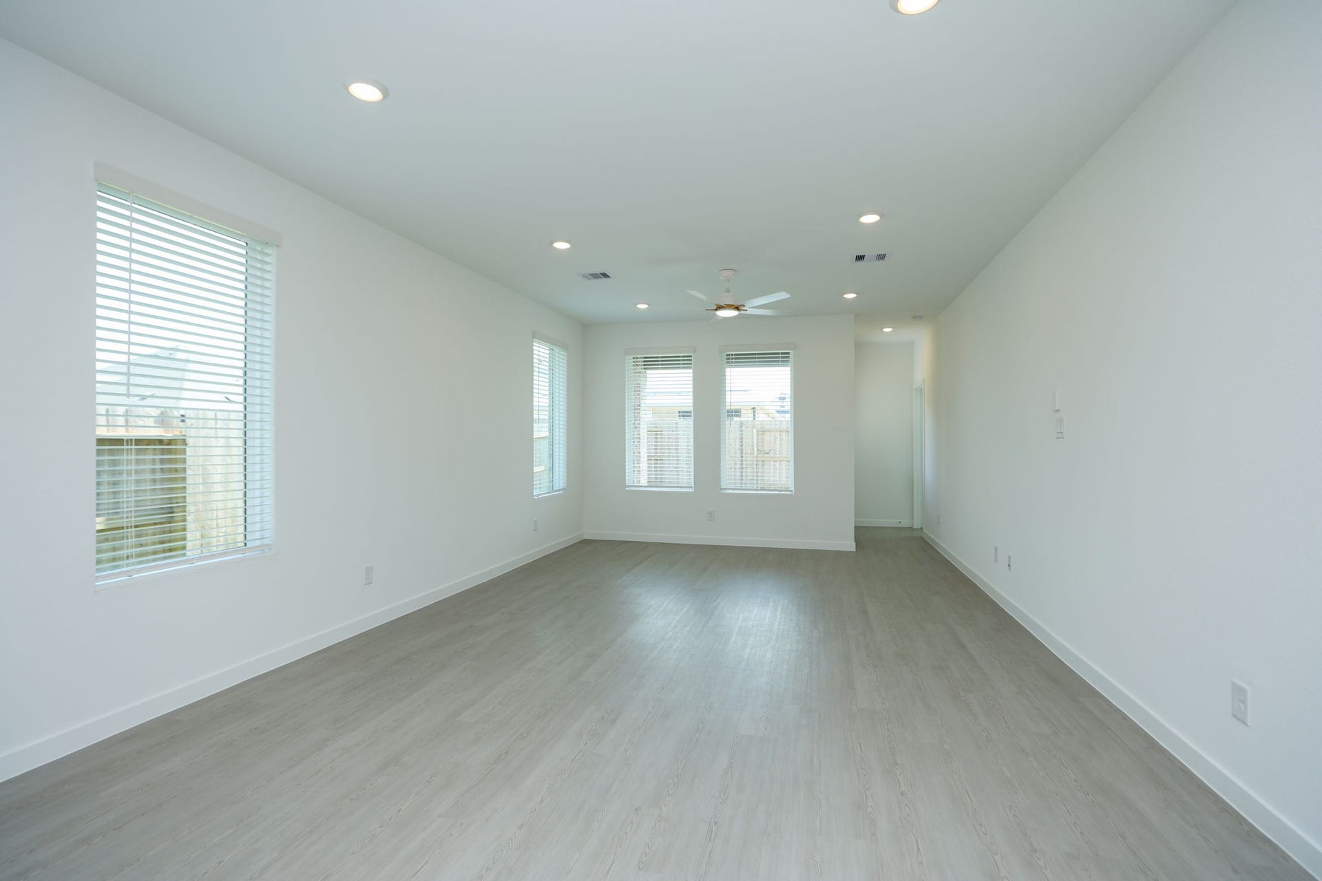 29039 Bison Haven Drive, Hockley, TX 77447 Living space combines dining area.
