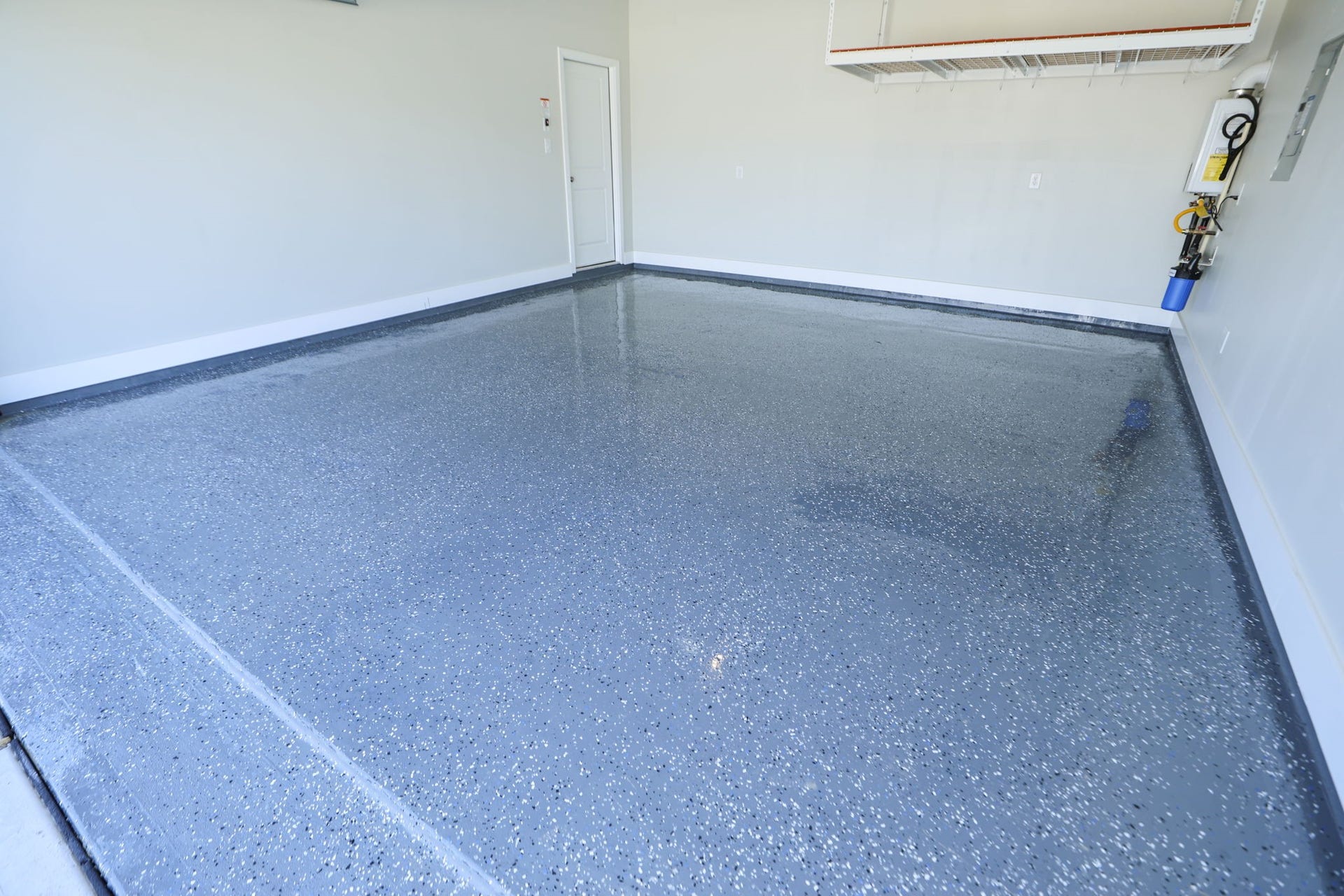 29039 Bison Haven Drive, Hockley, TX 77447 Beautiful epoxy floors in the garage