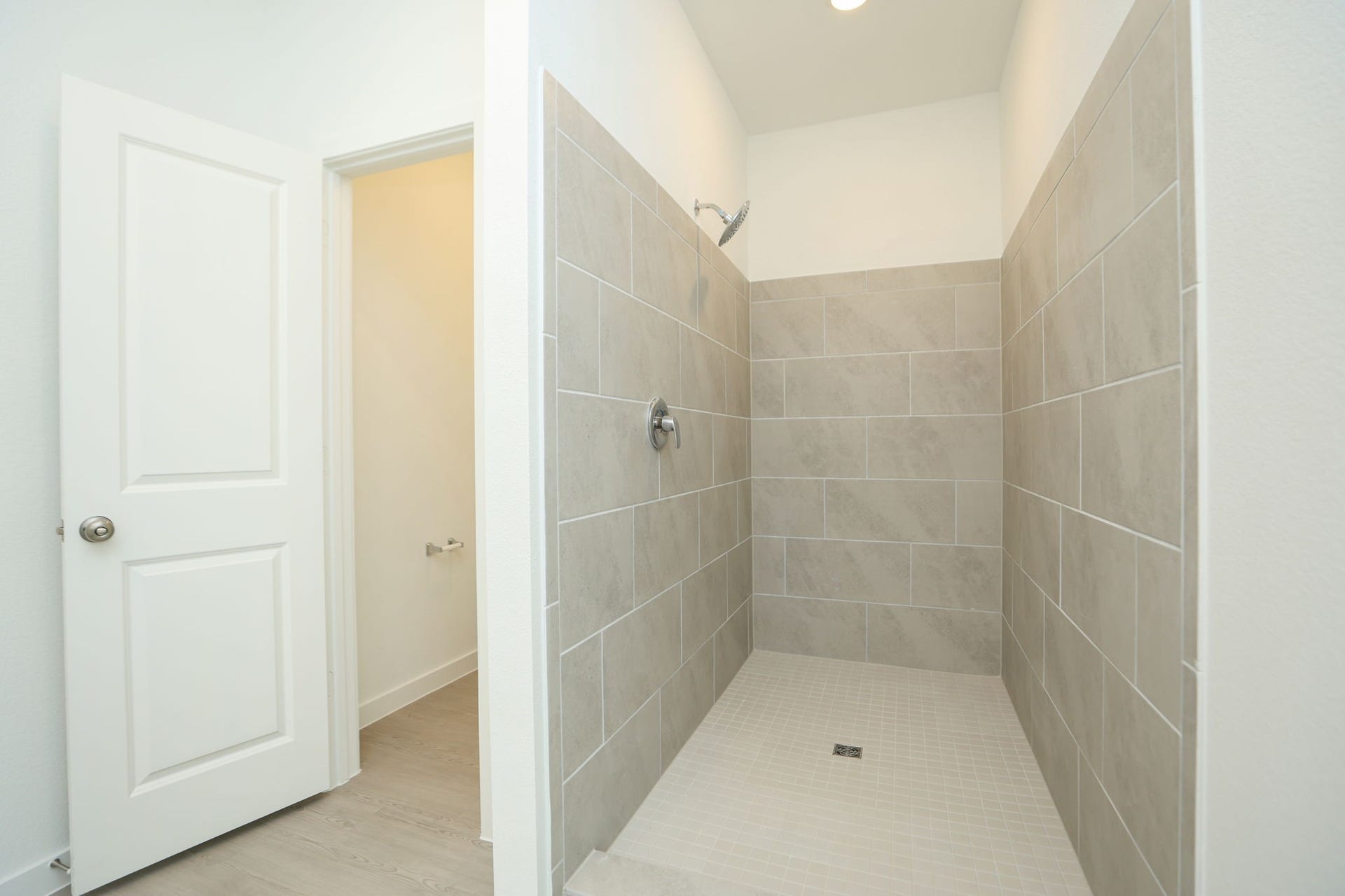 29039 Bison Haven Drive, Hockley, TX 77447 Large walkin shower located in primary bathroom.