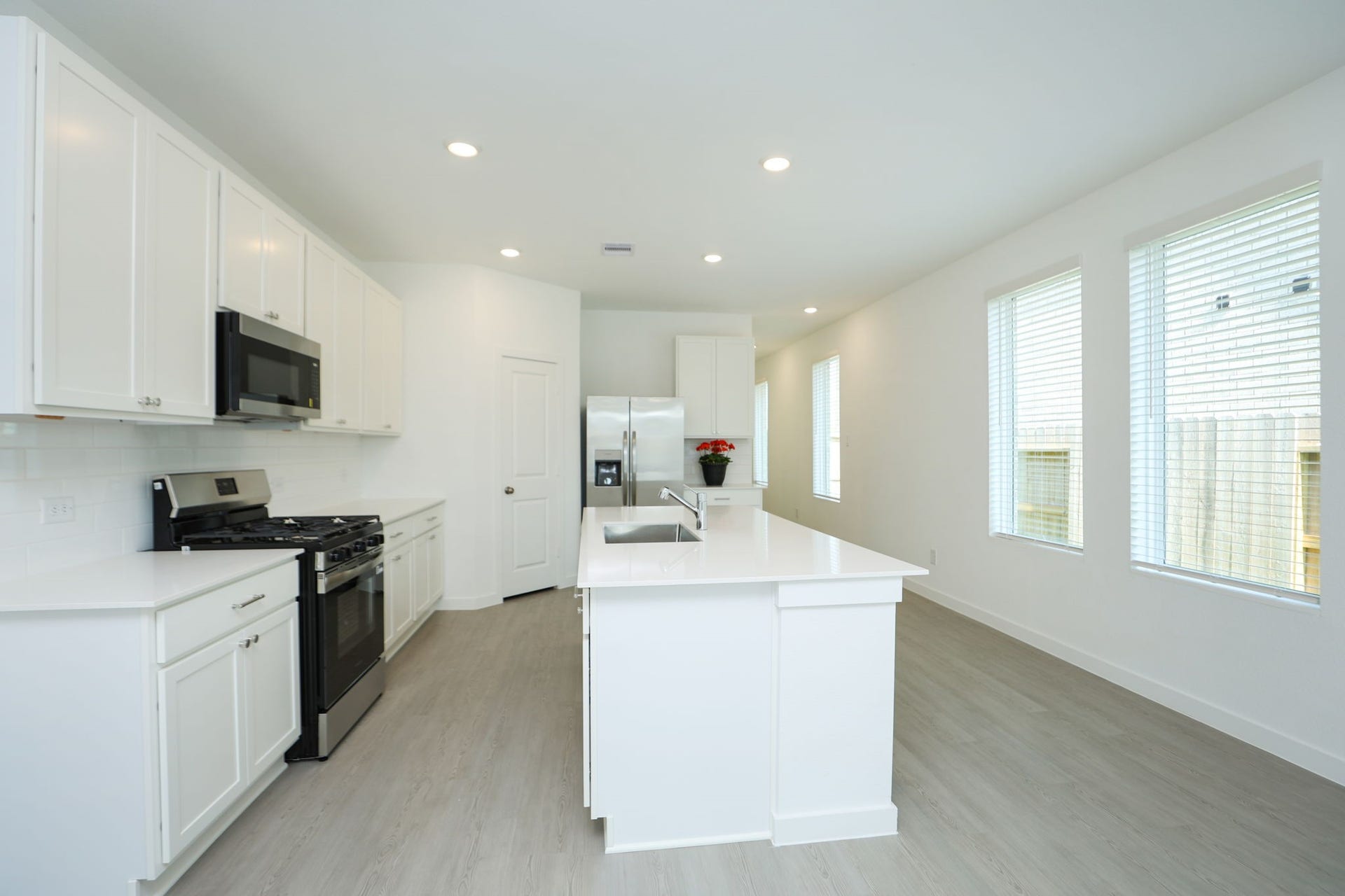 29039 Bison Haven Drive, Hockley, TX 77447 Large windows allow plenty of natural light. Blinds are on all windows.