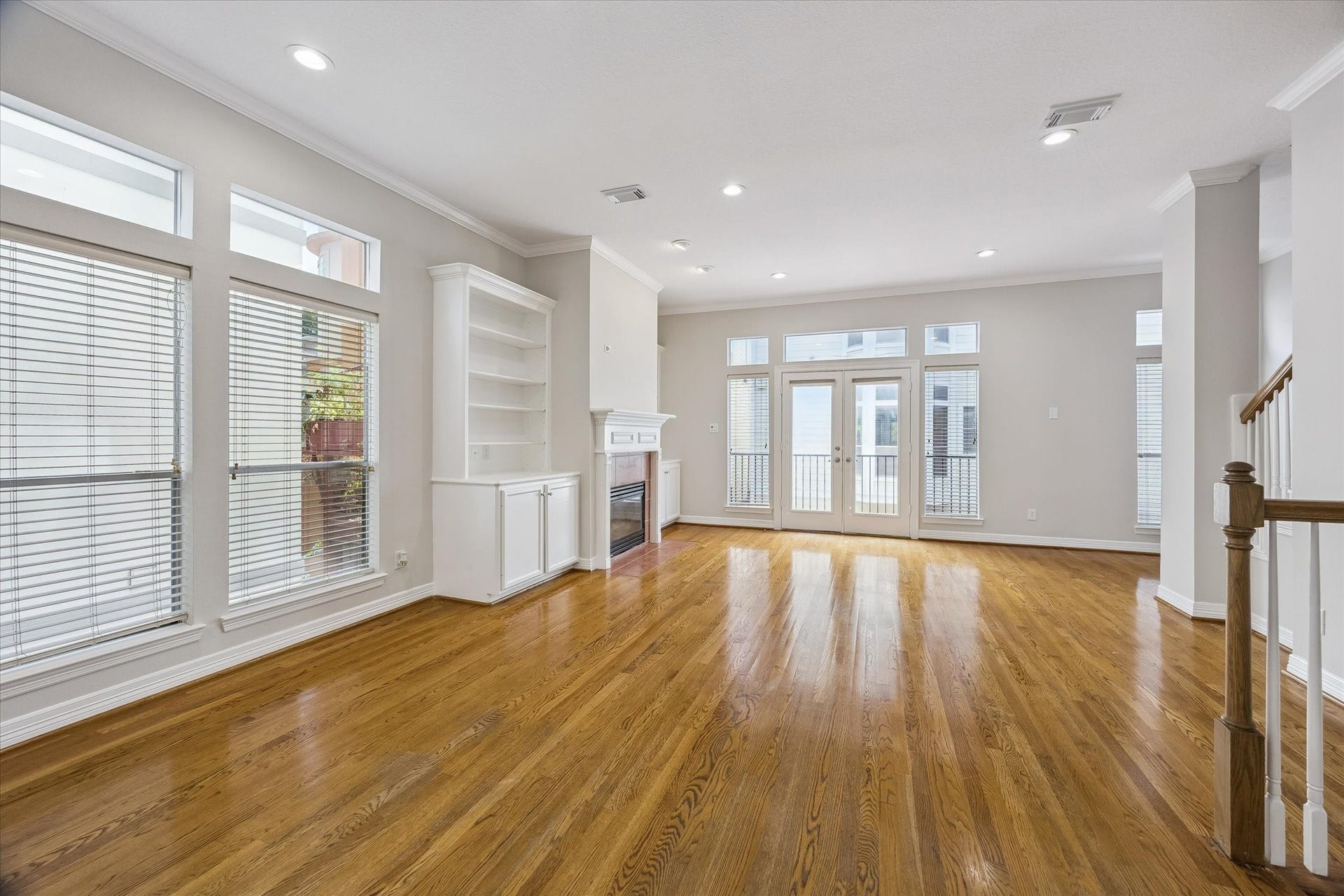 End-unit offers MAXIMUM natural light, pouring in from three sides! FRESH PAINT ON ALL INTERIOR SURFACES! Gleaming warm hardwood floors throughout 2nd floor!