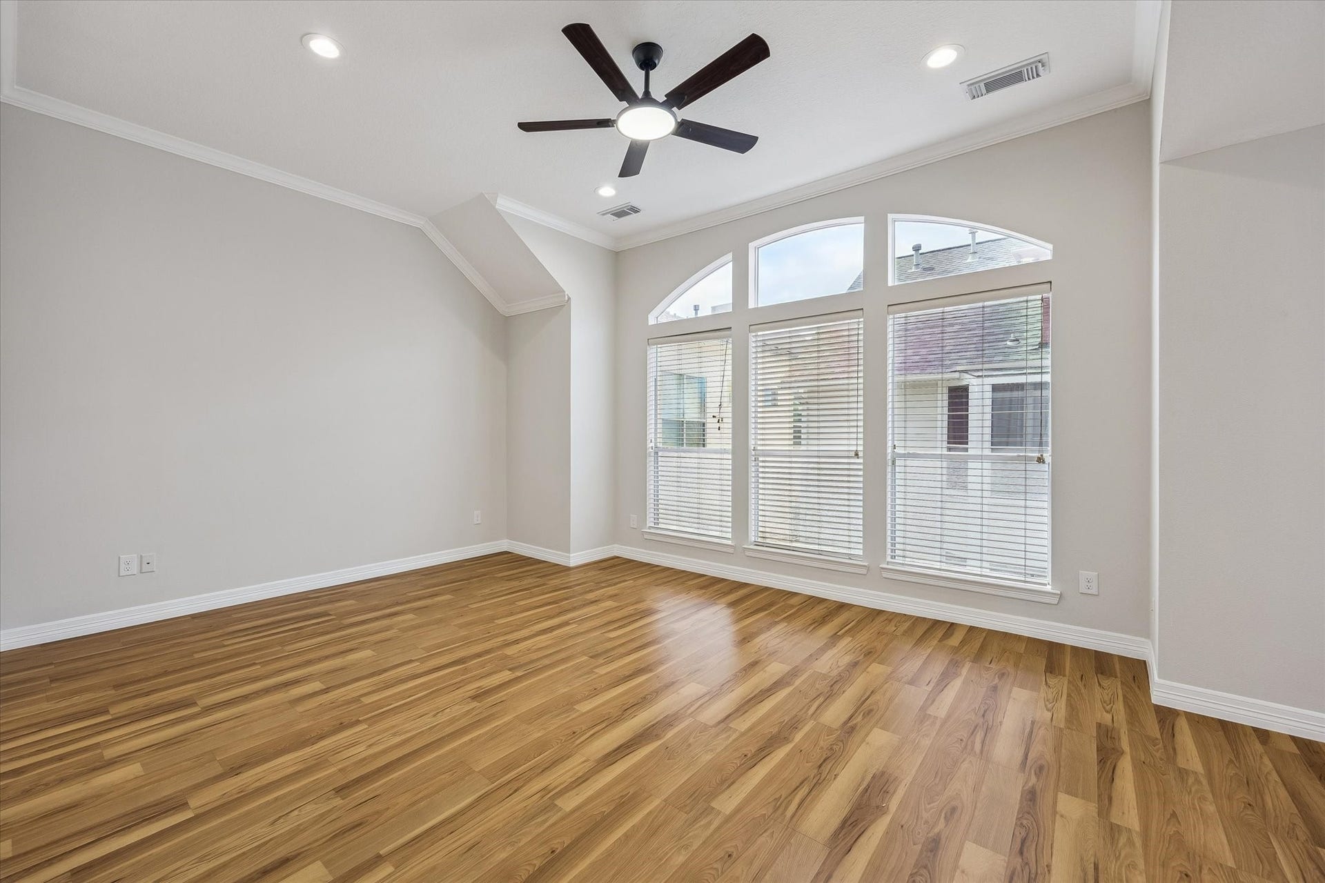 Primary is LIGHT & AIRY! Easily accommodates that California King bed! New remote-controlled fan & light installed!