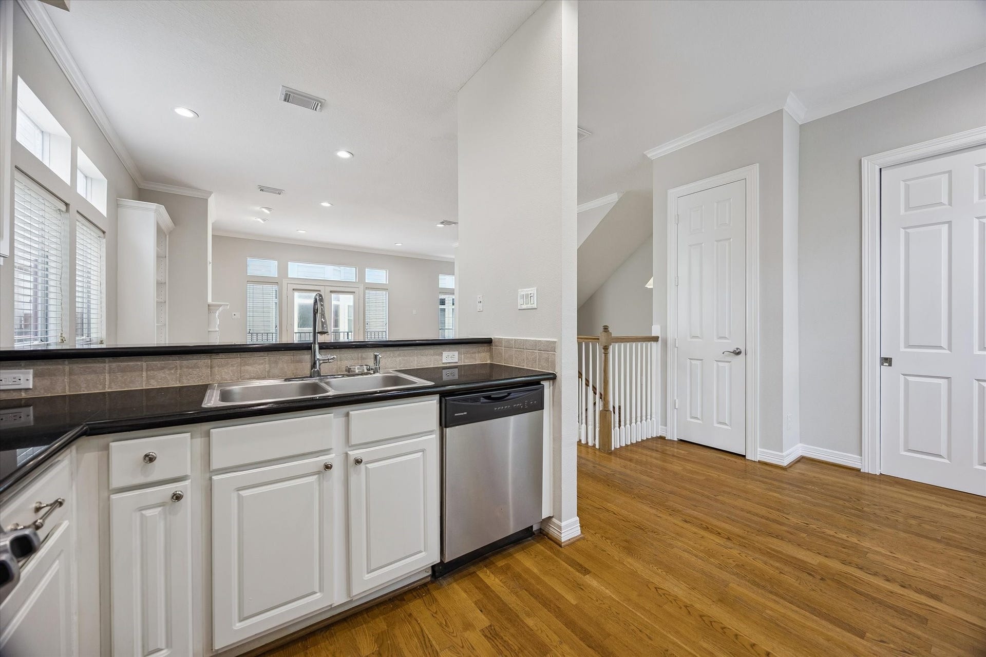 Above sink is a "bar-top" that could double as more informal eating space or just a great spot to serve up those delicious meals!