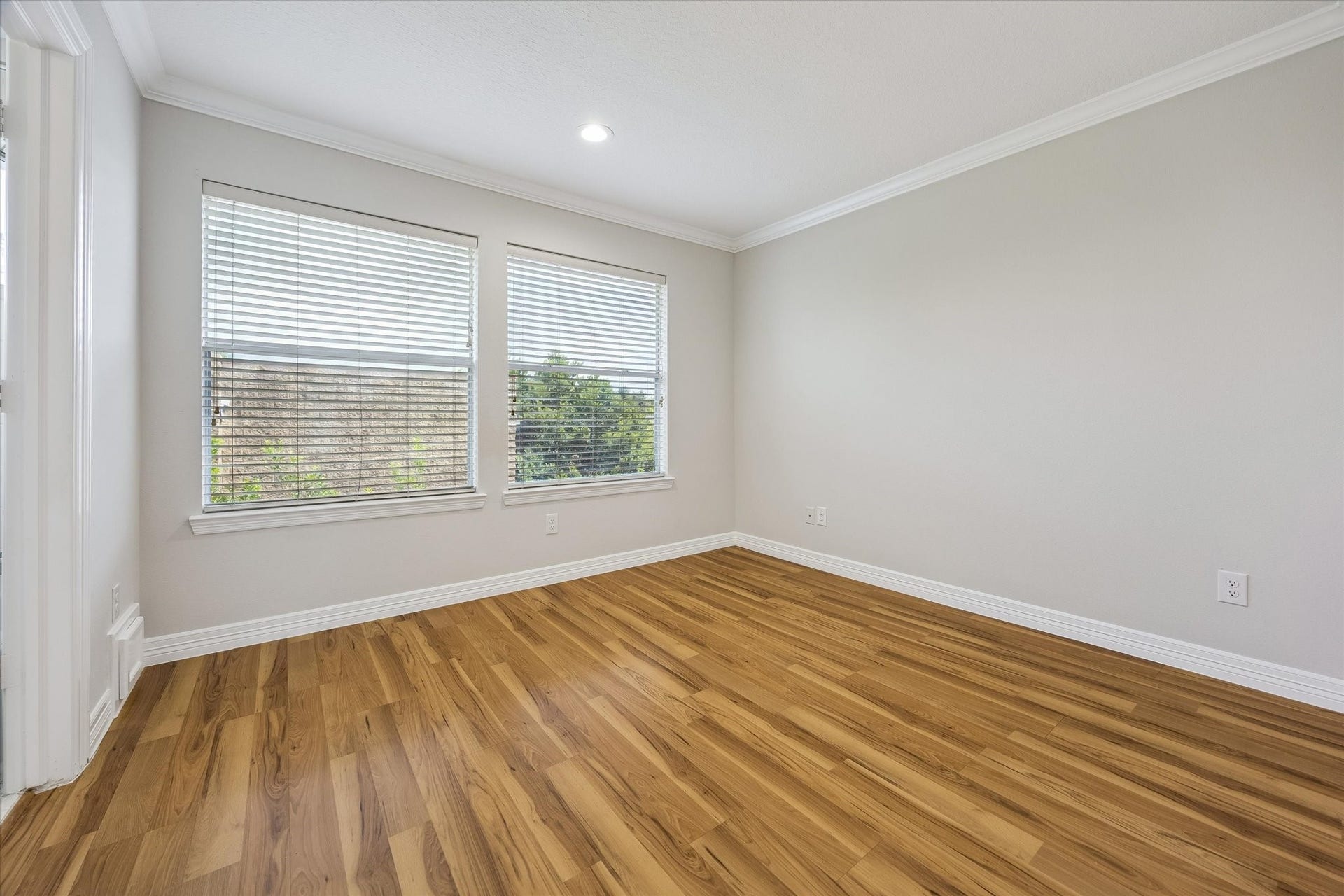 Secondary bedroom on third floor is perfect with its own en-suite bathroom! Big windows with view of Downtown buildings!