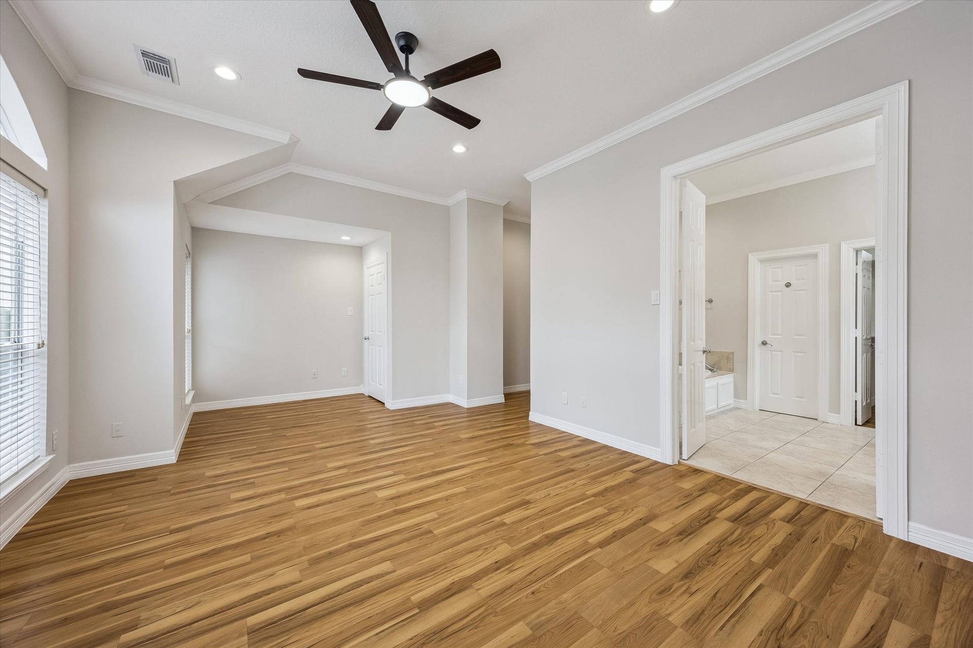 Impressive double doors lead to the LUXURIOUS master bath!