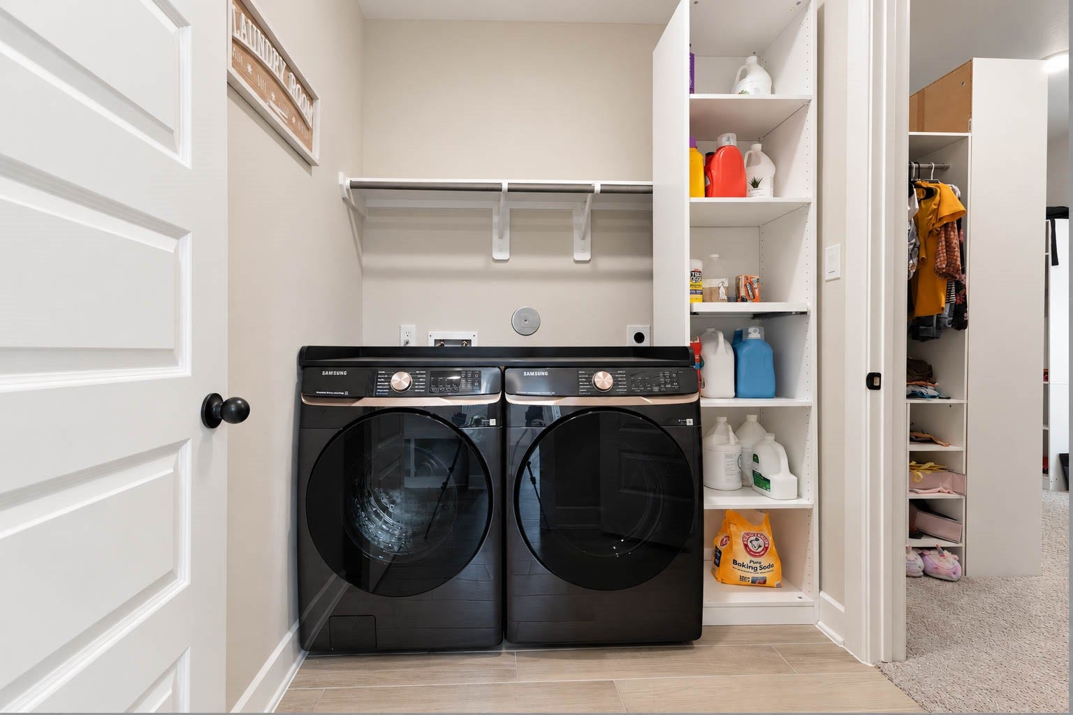 3165 Stingray Cove Drive, Katy, TX 77493 The thoughtfully designed laundry room offers excellent functionality with dedicated washer and dryer connections & an overhead shelf with a hanging rod. The rooms convenient connection to the adjoining closet adds another layer of everyday practicality.