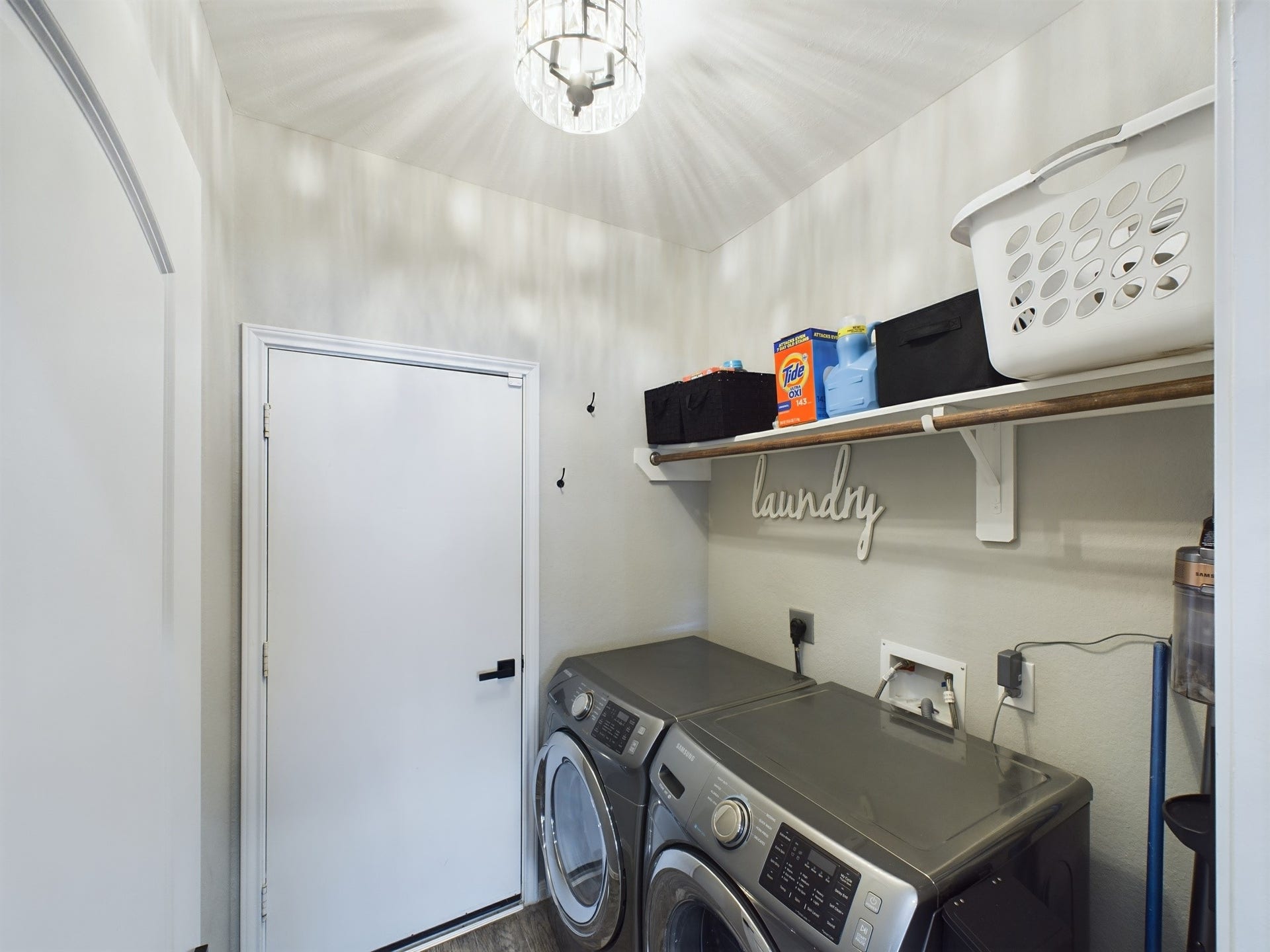Full Sized Washer & Dryer w/Gas & Electric Connections. Also allows access to the 2-car garage.