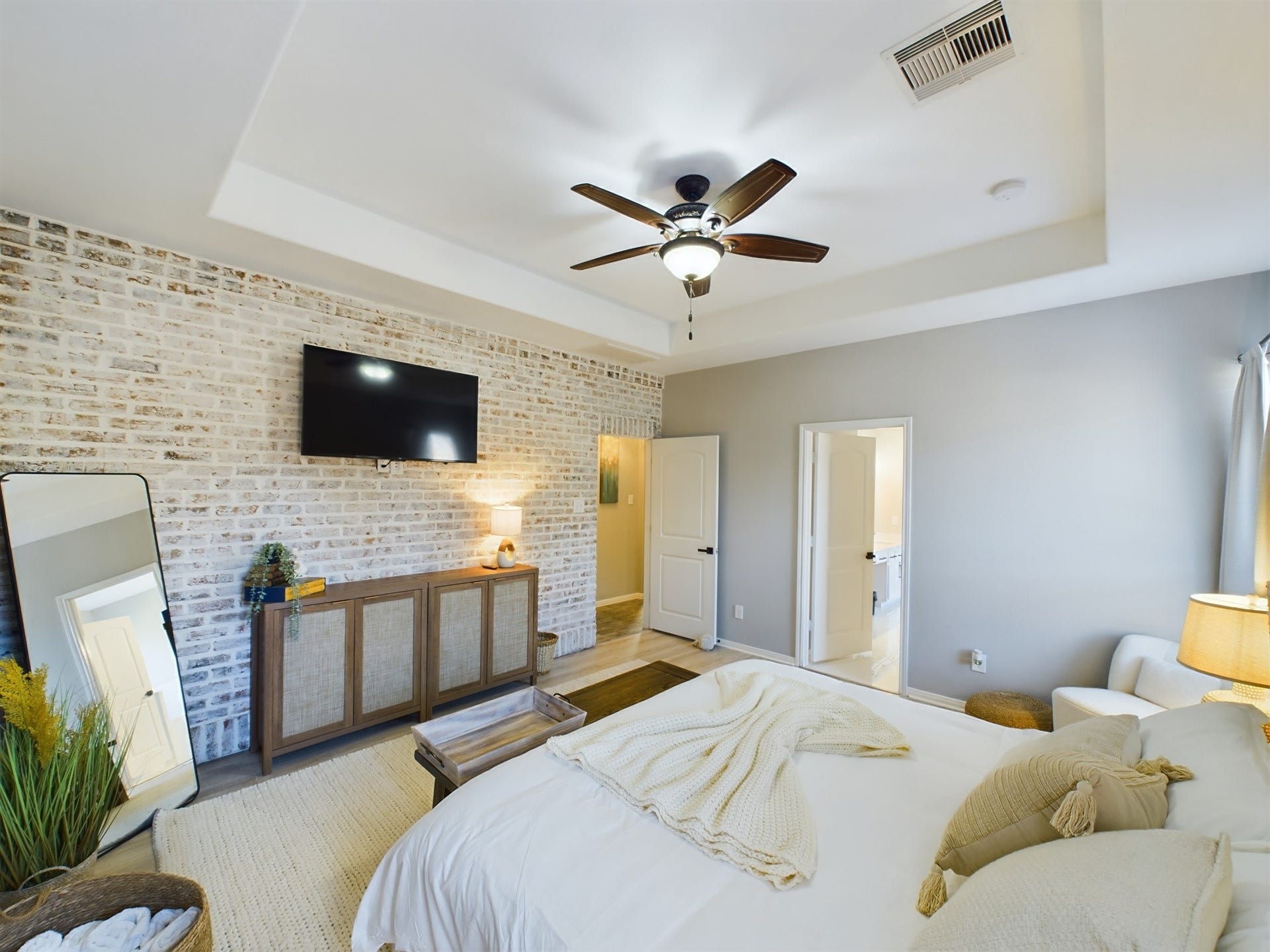 White-wash Brick Accent Wall & Tray Ceiling