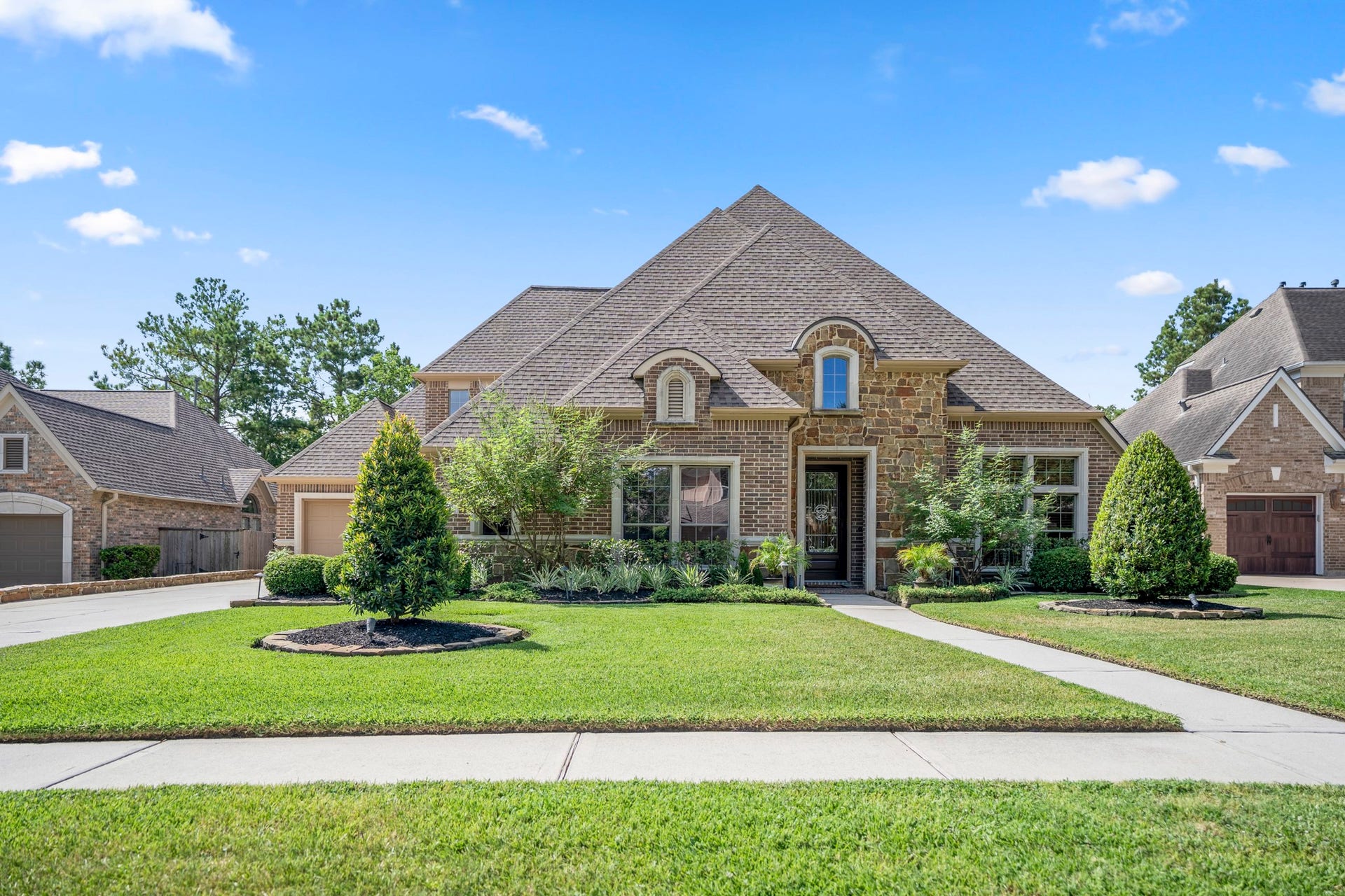 2407 Hendricks Lakes Drive, Spring, TX 77388 Welcome to 2407 Hendricks Lakes Drive in gated Lakes of Cypress Forest, where manicured landscaping and a brick-and-stone exterior create a polished first impression.