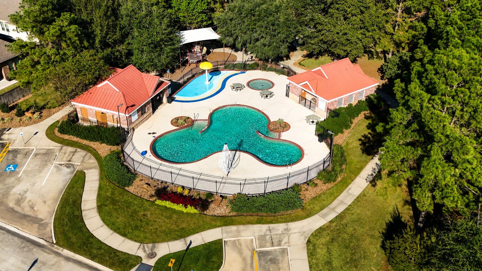 2407 Hendricks Lakes Drive, Spring, TX 77388 Lakes of Cypress Forest amenities add another layer to the water-view lifestyle, with a community pool, splash pad, shaded seating areas, and nearby paths surrounded by mature greenery. Its an easy extension of the neighborhoods outdoor feel, giving residents another place to swim, relax, and enjoy time outside close to home.