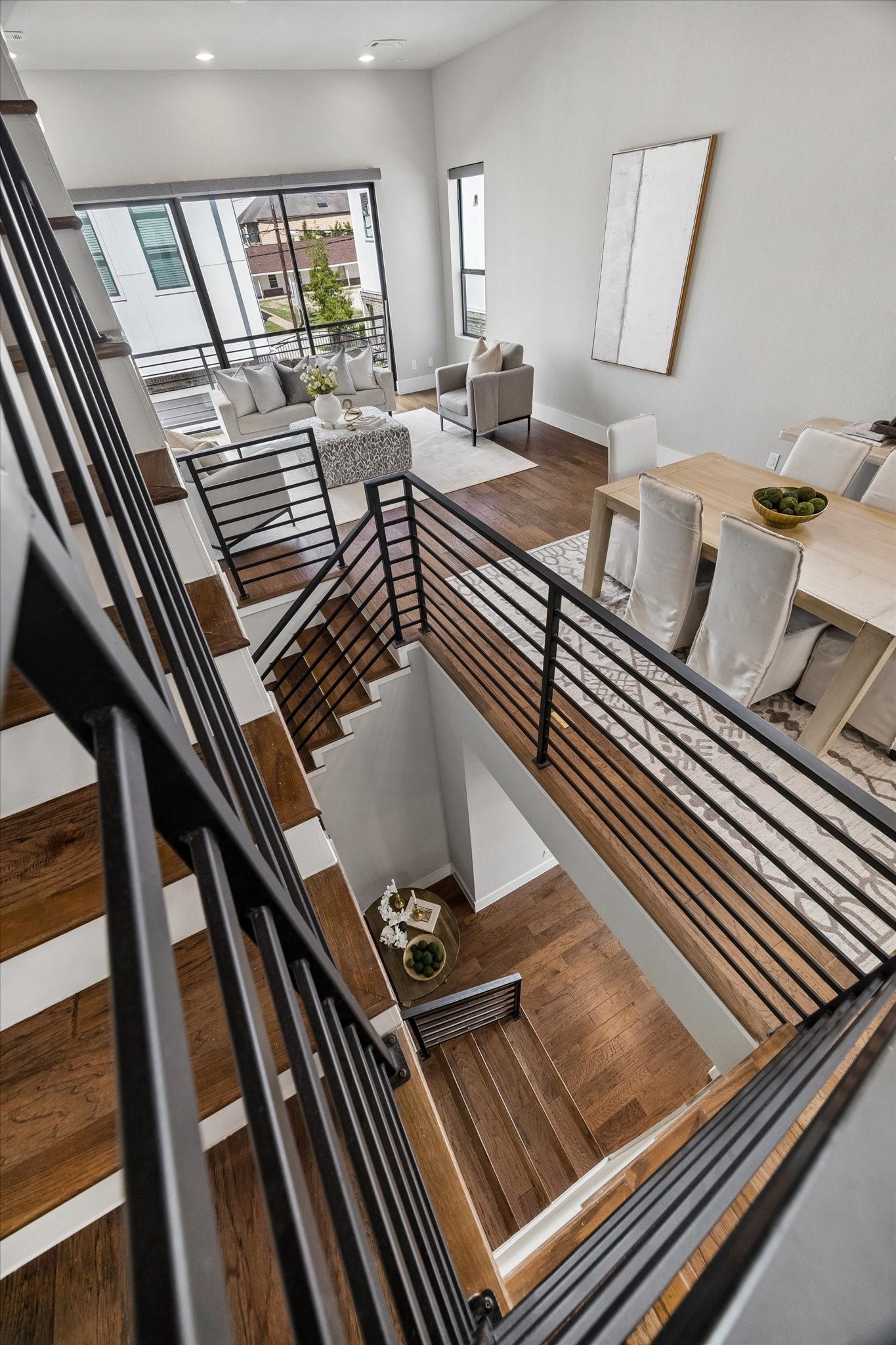 5707 Larkin Street, #B, Houston, TX 77007 The iron stair rails add to the contemporary sleek style of this three story home.