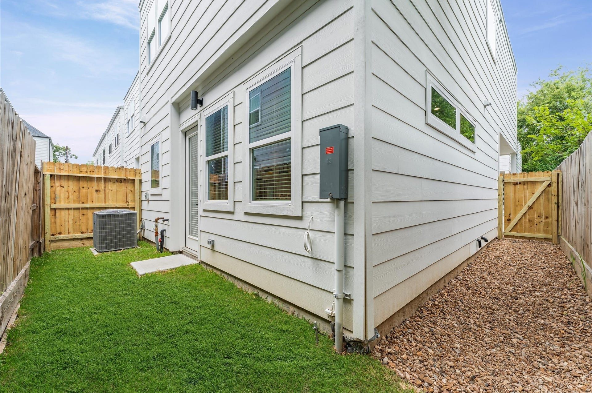 412 Neyland Street, #G, Houston, TX 77022 This charming small backyard offers a cozy outdoor escape, thoughtfully arranged to maximize space and comfort. Whether framed by lush greenery, a petite patio, or a few well-placed planters, the area invites relaxation and connection with nature.