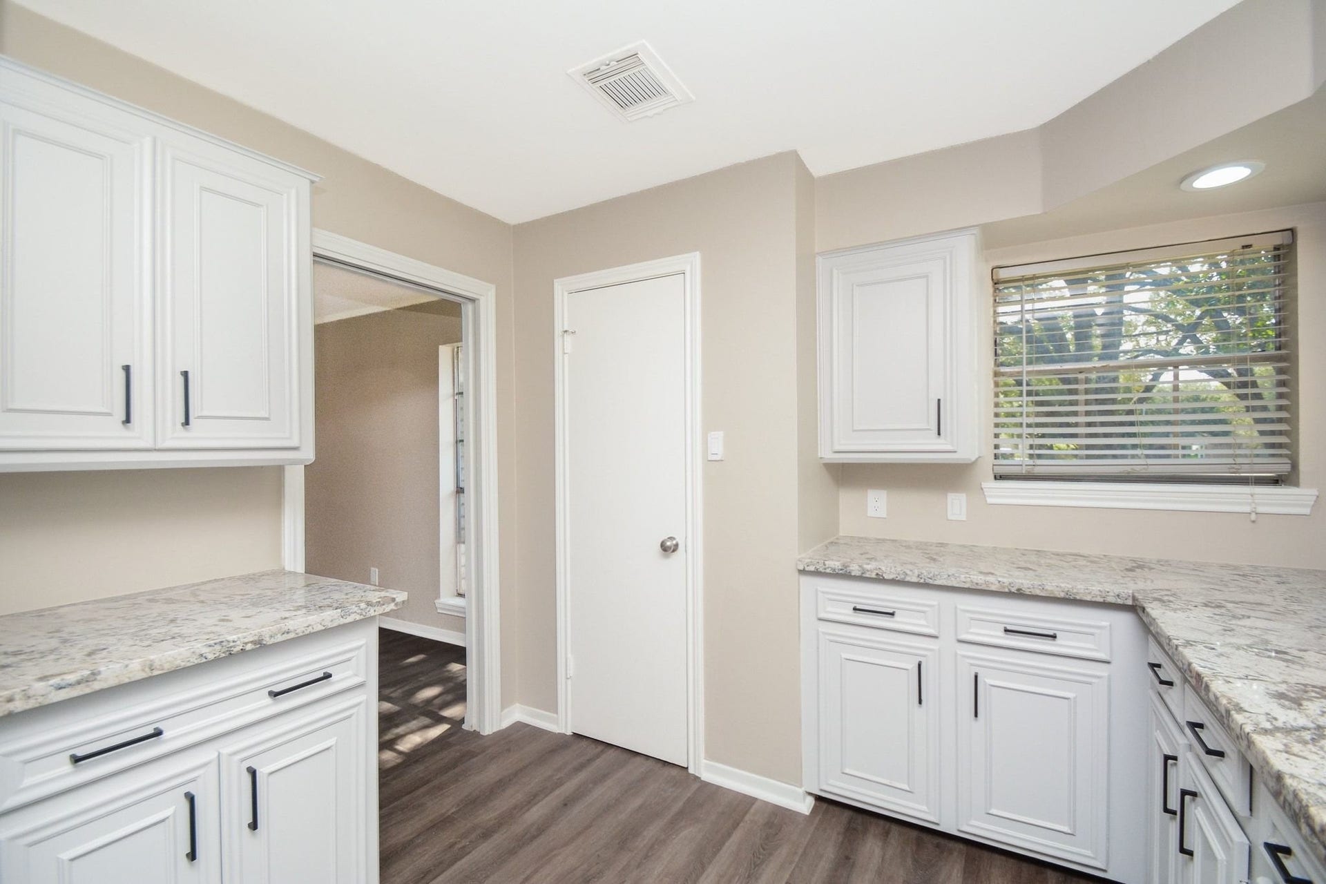 3018 Apple Valley Lane, Missouri City, TX 77459 In this kitchen view, counters freely line walls, with a welcomed window, above.
