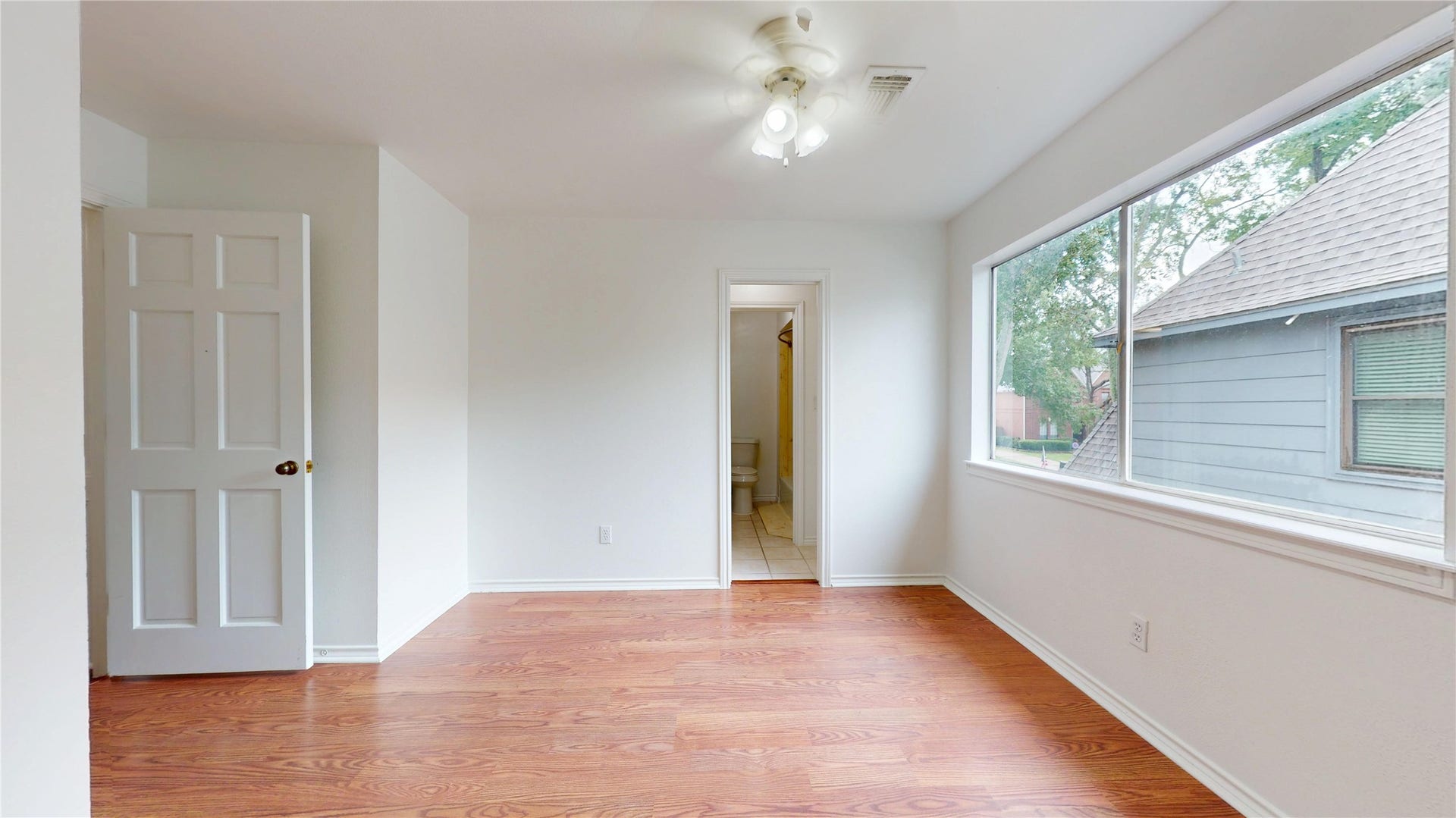 1407 Sherfield Ridge Drive, Katy, TX 77450 1407 Sherfield Ridge Dr, Bedroom #4 on the 2nd floor and at the end of the halway. Laminate wooden flooring, entry to jack-and jill bathroom and large window.
