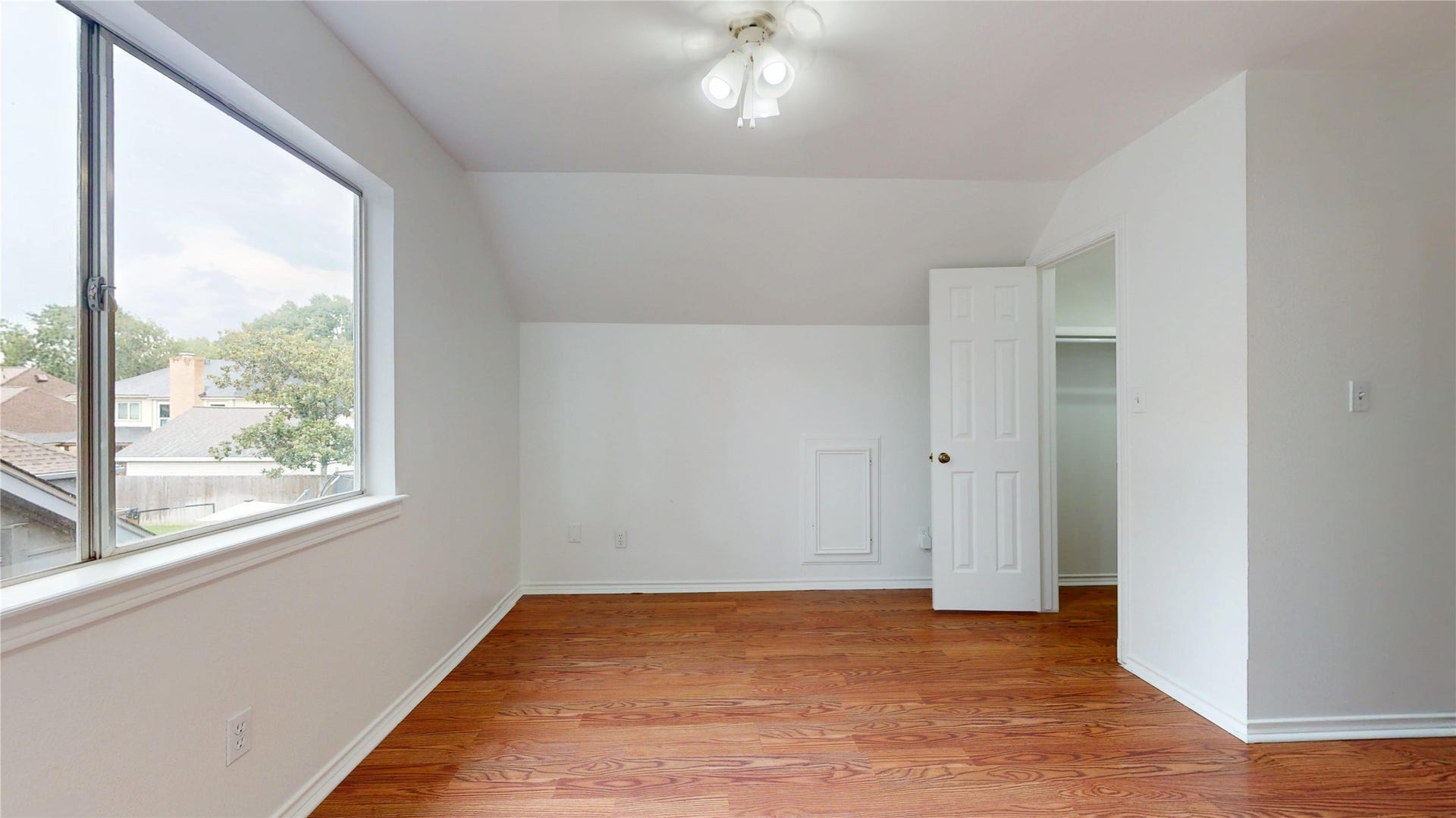1407 Sherfield Ridge Drive, Katy, TX 77450 1407 Sherfield Ridge Dr, Bedroom #4 on the 2nd floor and at the end of the halway. Laminate wooden flooring, walk-in closet, and large window.