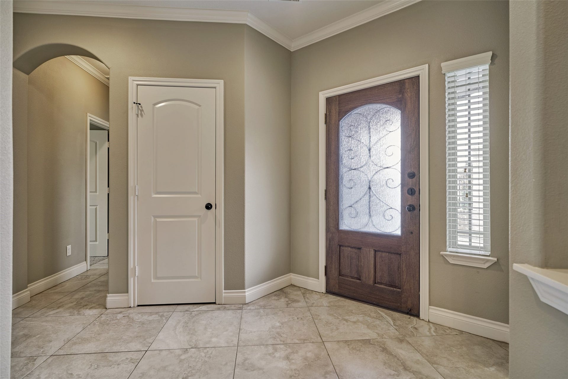 119 Bessie Price Owens Drive, Montgomery, TX 77356 The opposite side of the foyer has a coat closet.