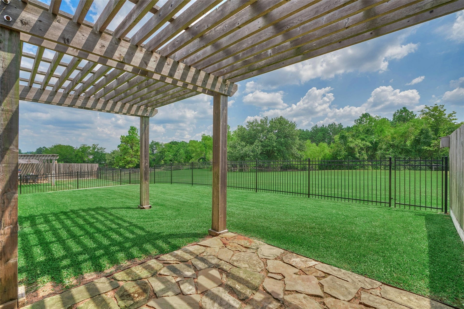 119 Bessie Price Owens Drive, Montgomery, TX 77356 Soak in the picturesque setting and quiet surroundings.