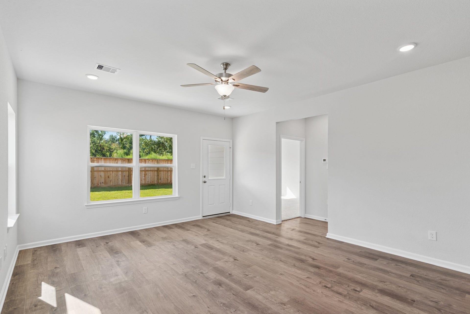 1626 River Scene Trail, Dayton, TX 77535 The Sparrow II- Family Room. Sample floor plan image for illustration; upgrades, options, and colors may vary.