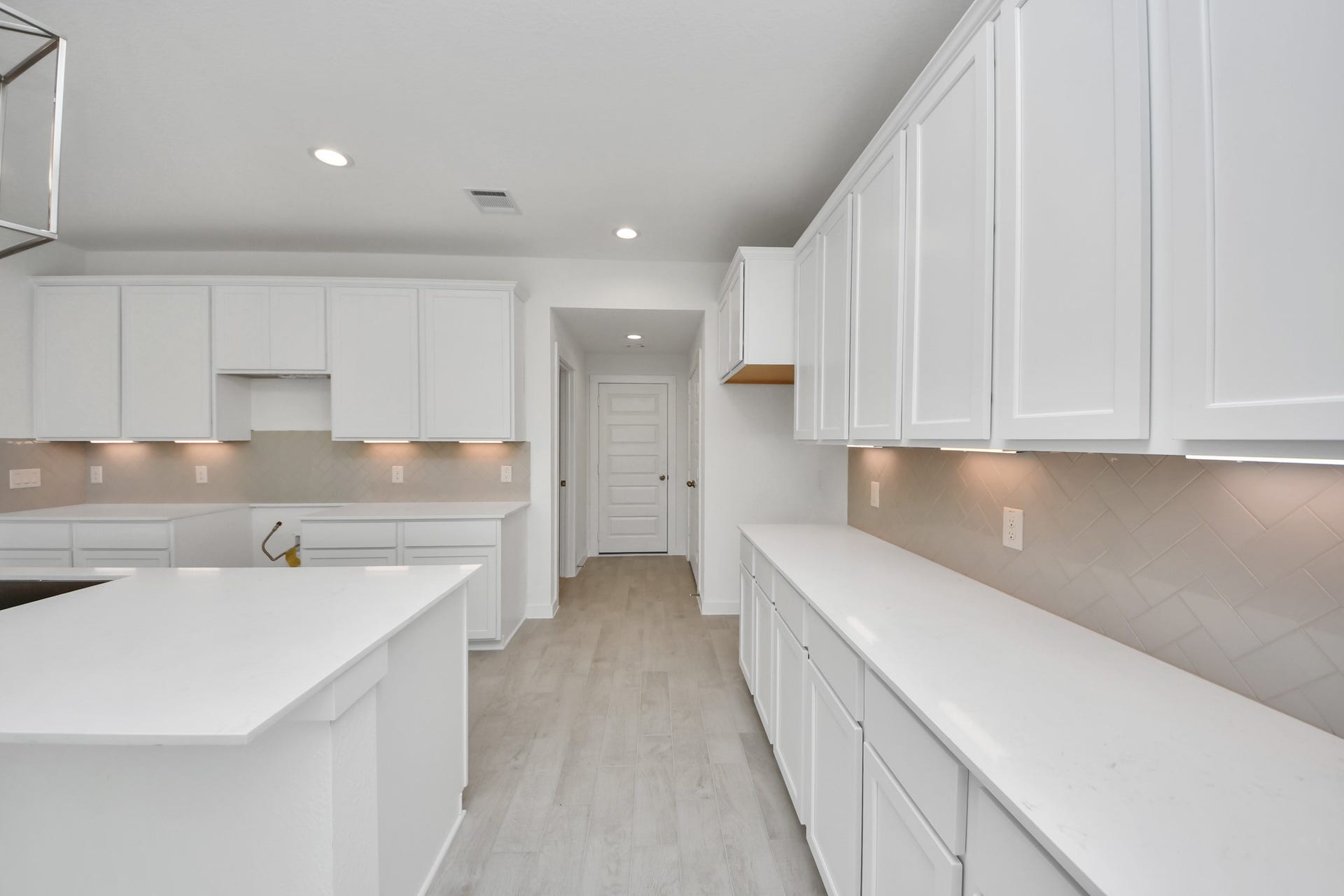 This generously spacious kitchen is a dream realized! Sample photo of completed home with similar floor plan. Actual colors and selections may vary.